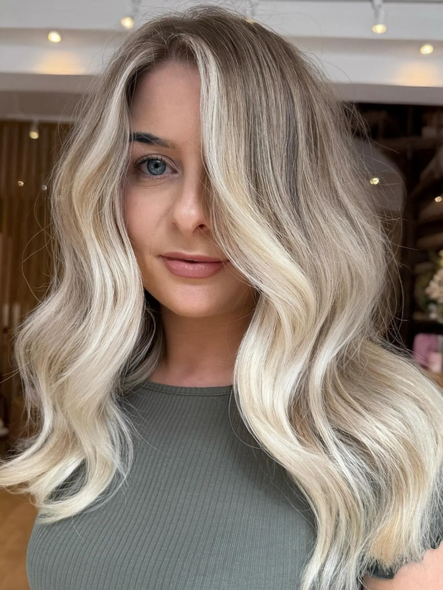 10. Platinum Blonde Glam Waves (Icy Blonde Hair Color)