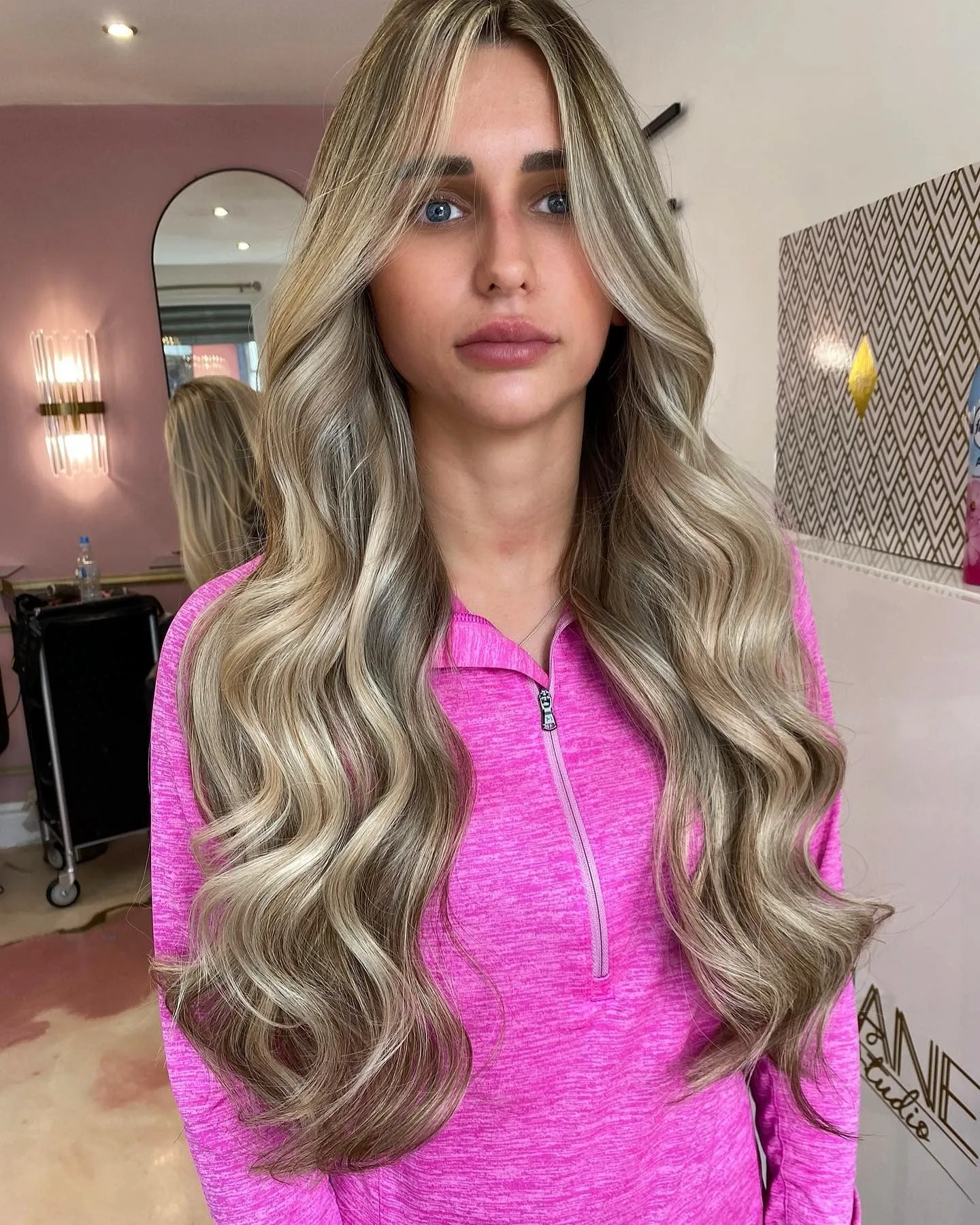 12. Icy Dimensional Blonde with Flowing Layers (Tousled Hairstyles)