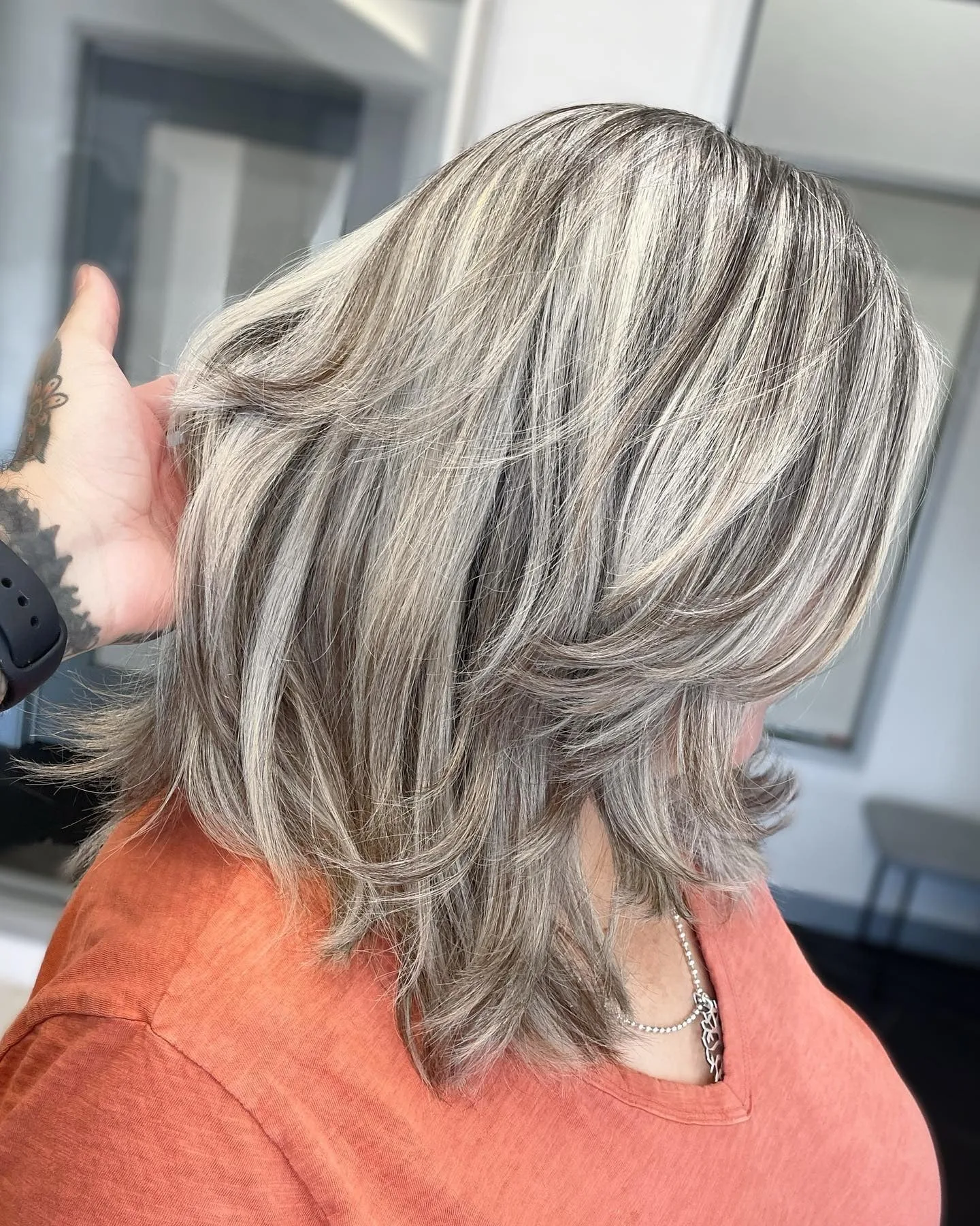 2. Layered Silver Frost (Icy Blonde Hair Color)