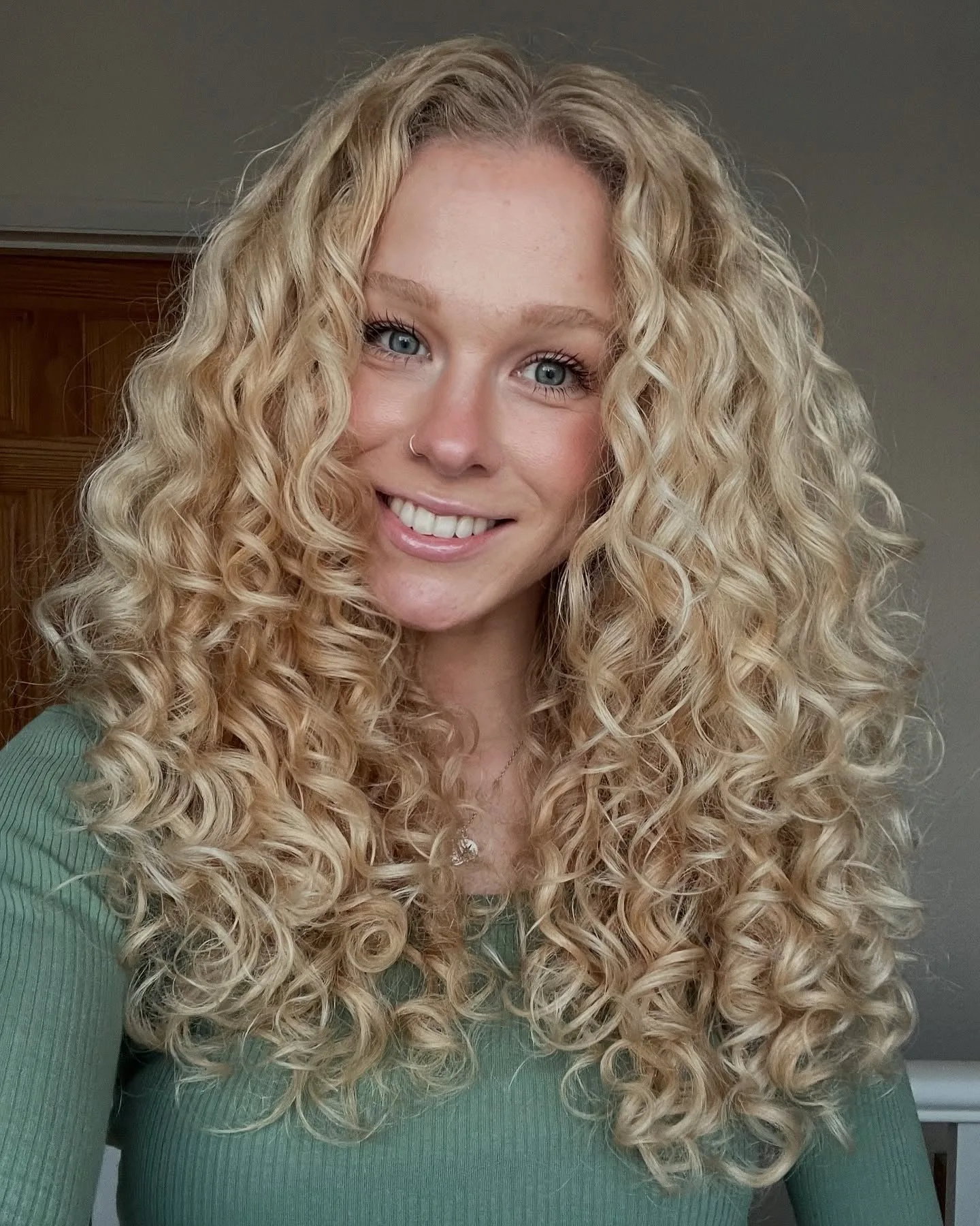 3. Golden Blonde Ringlets (Messy Curly Hair)