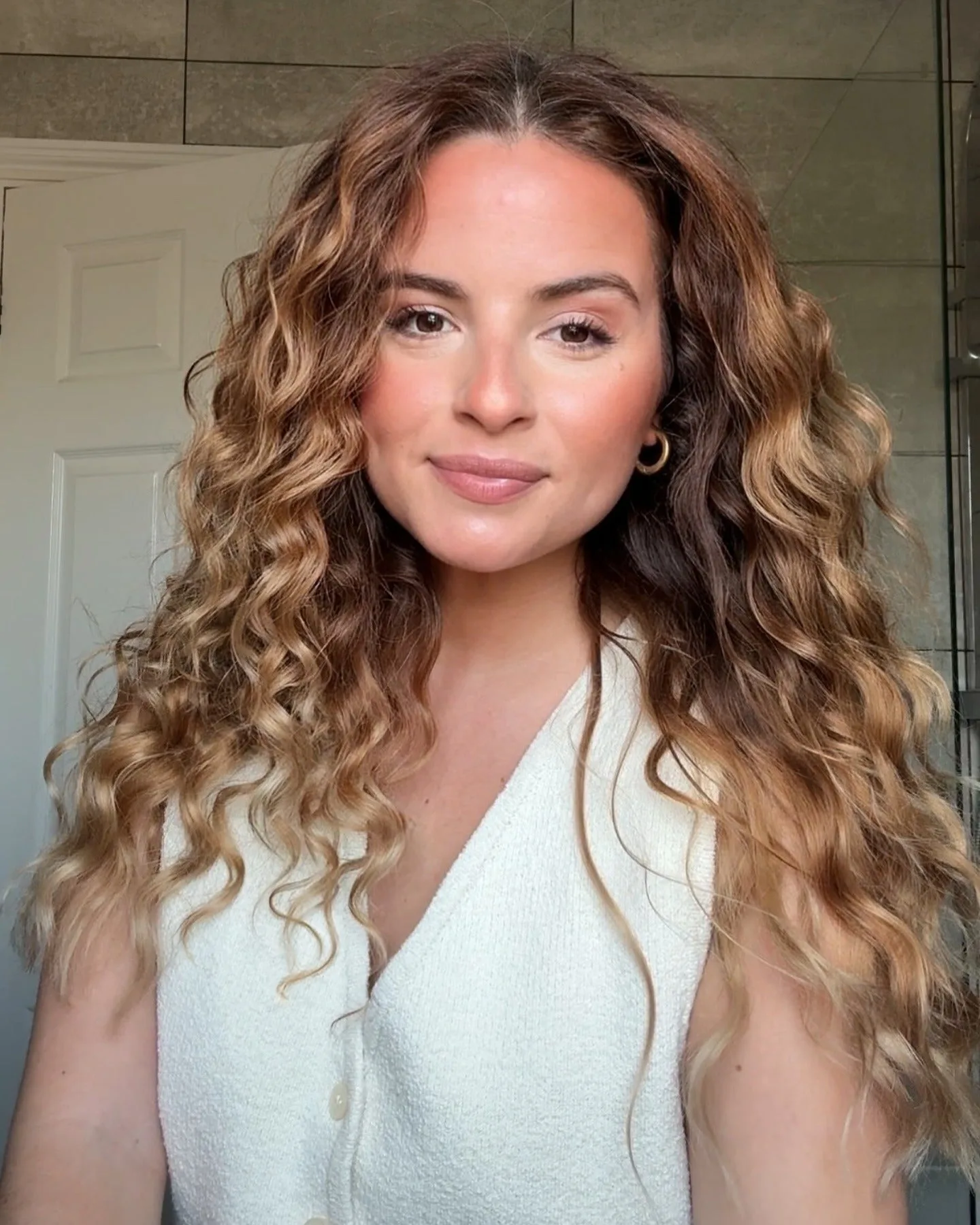 4. Ombre Brunette with Textured Waves (Messy Curly Hair)