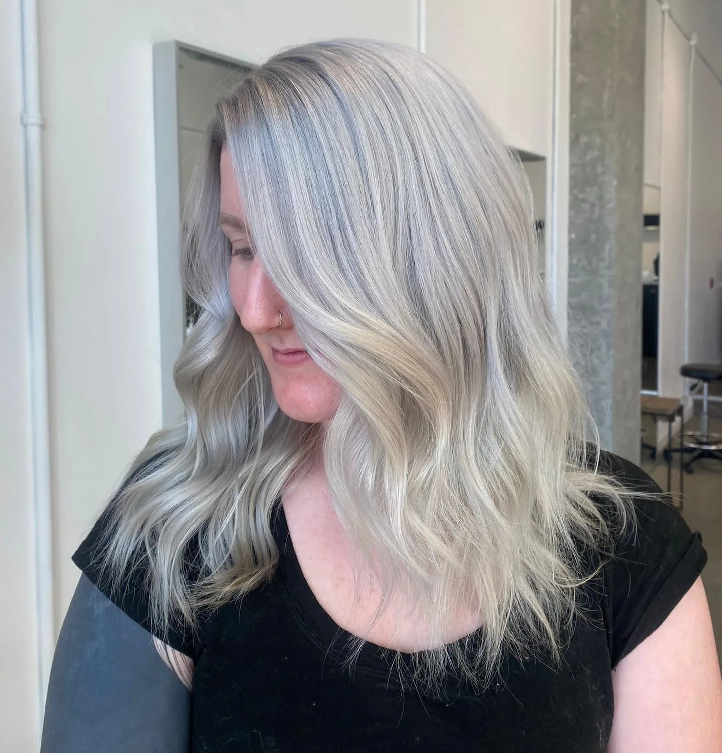 4. Silver Ash Platinum with Side-Swept Layers (Ash Platinum Hair Color)