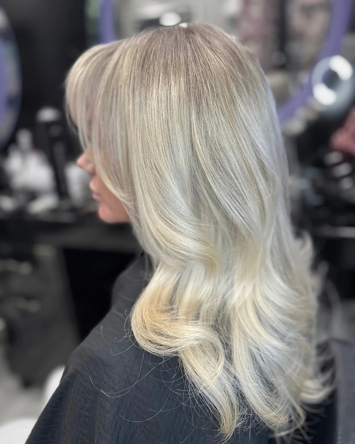 4. Soft Silver Blonde with Face-Framing Layers (Icy Blonde Hair Color)
