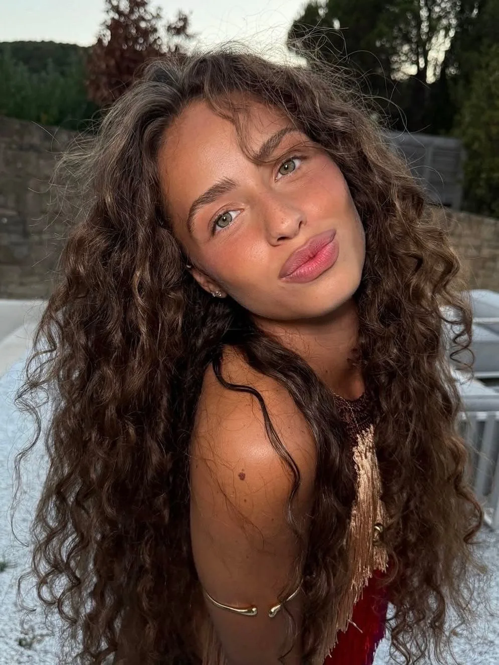 5. Dark Brown Free-Flowing Curls (Messy Curly Hair)