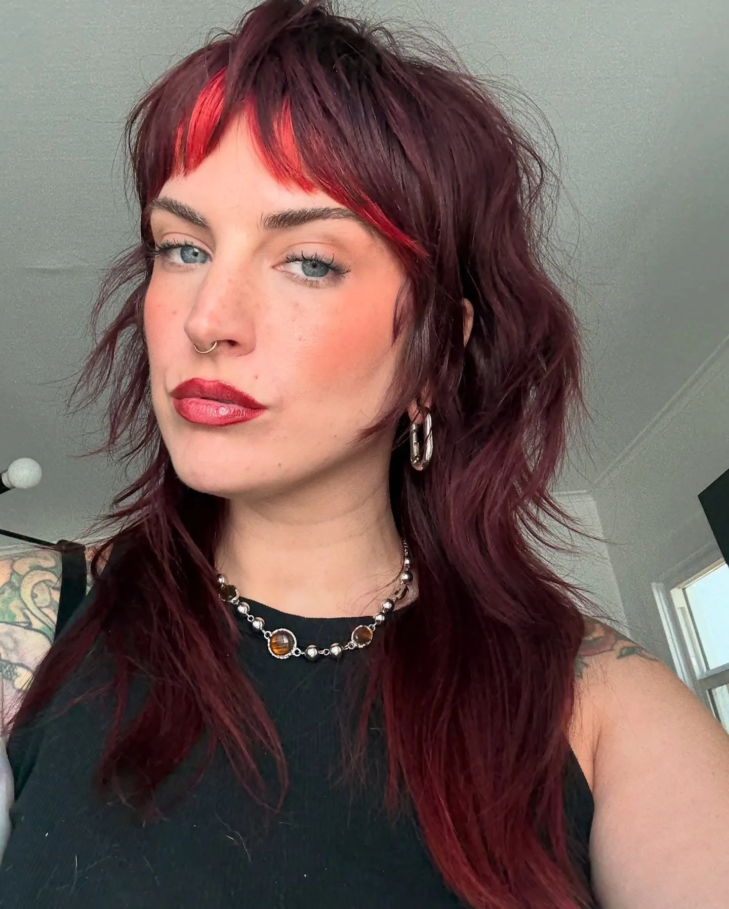 8. Deep Red Shag with Scarlet Highlights (Medium Layered Shag)