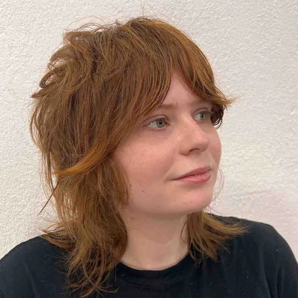 Smoky Lilac Wolf Cut for Women Over 40 layered shag with soft lavender tones and natural volume.