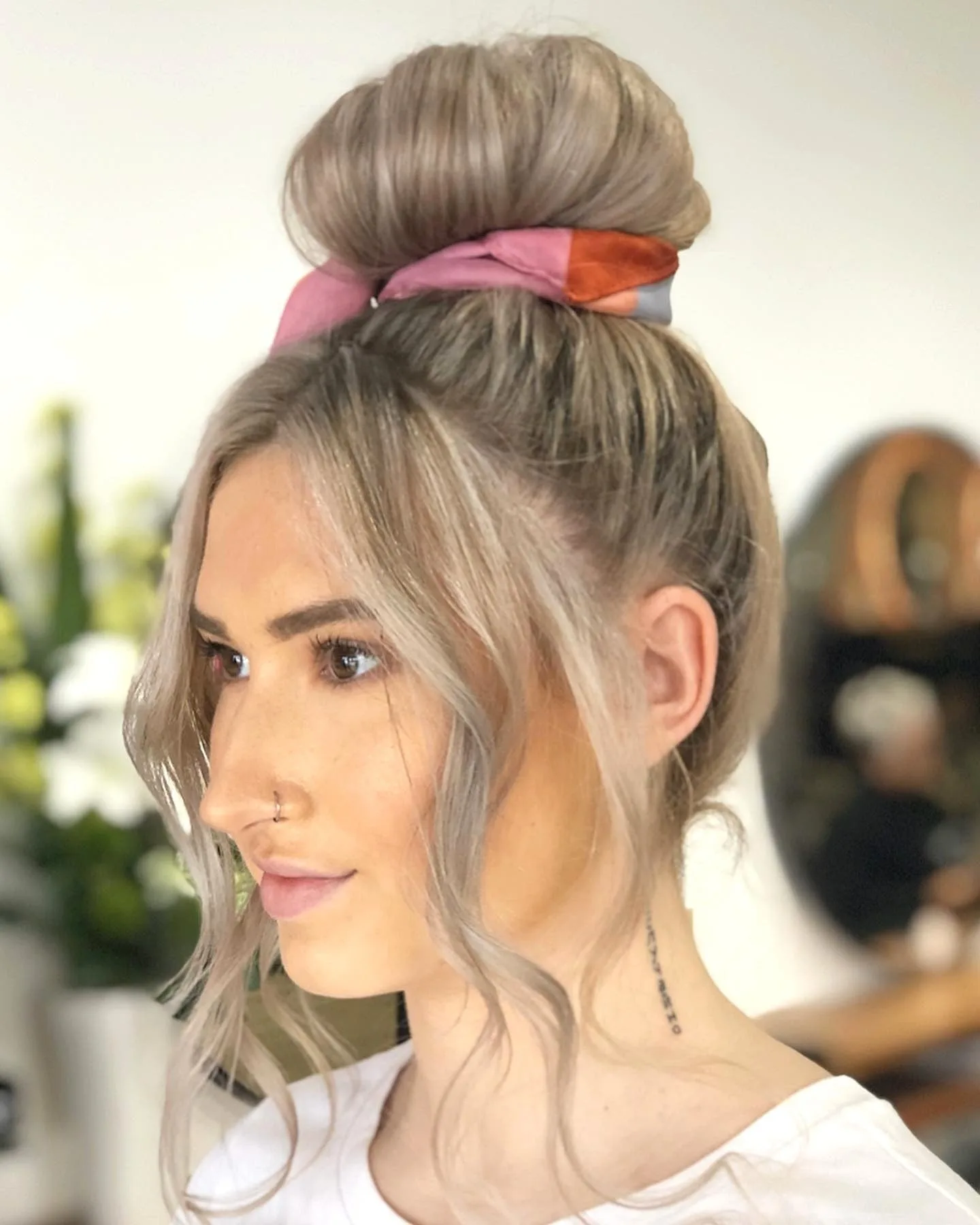 1. Elegant Ash Blonde Top Knot with Soft Face Framing Layers (Top Knot Hairstyles)