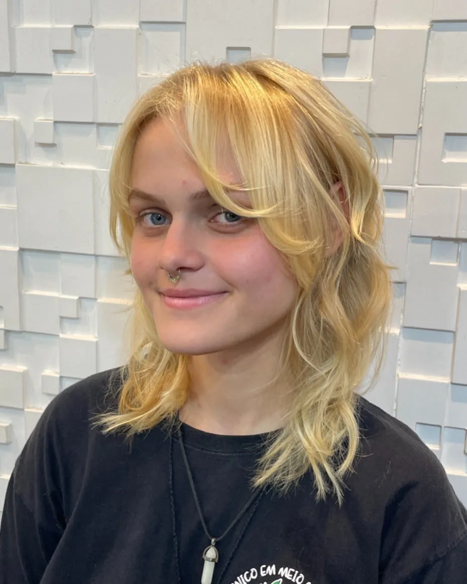 1. Soft Layered Blonde Shag with Curtain Fringe (Shaggy Haircuts)