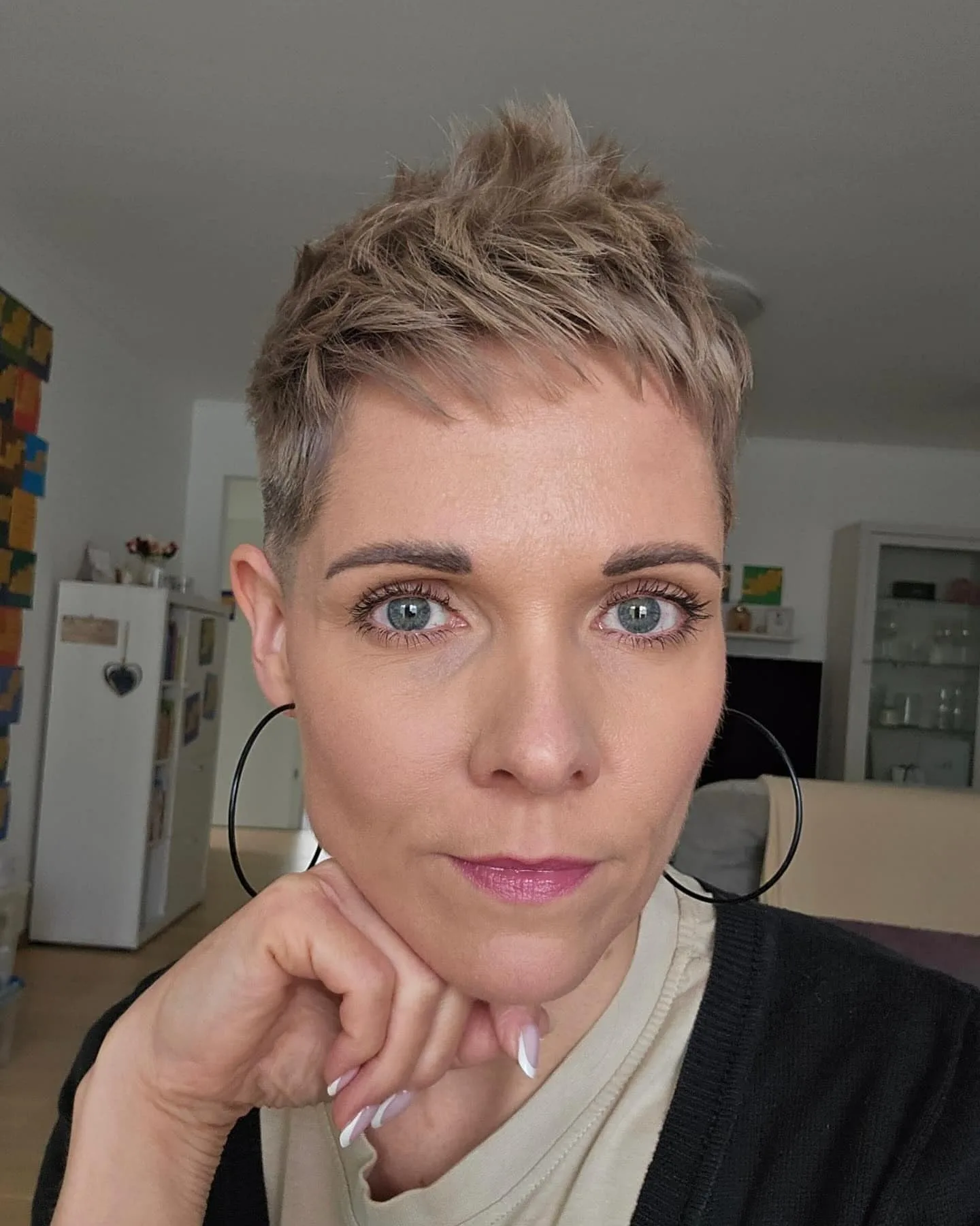 1. Textured Ash Blonde Pixie Cut (Wispy Pixie Hairstyles)