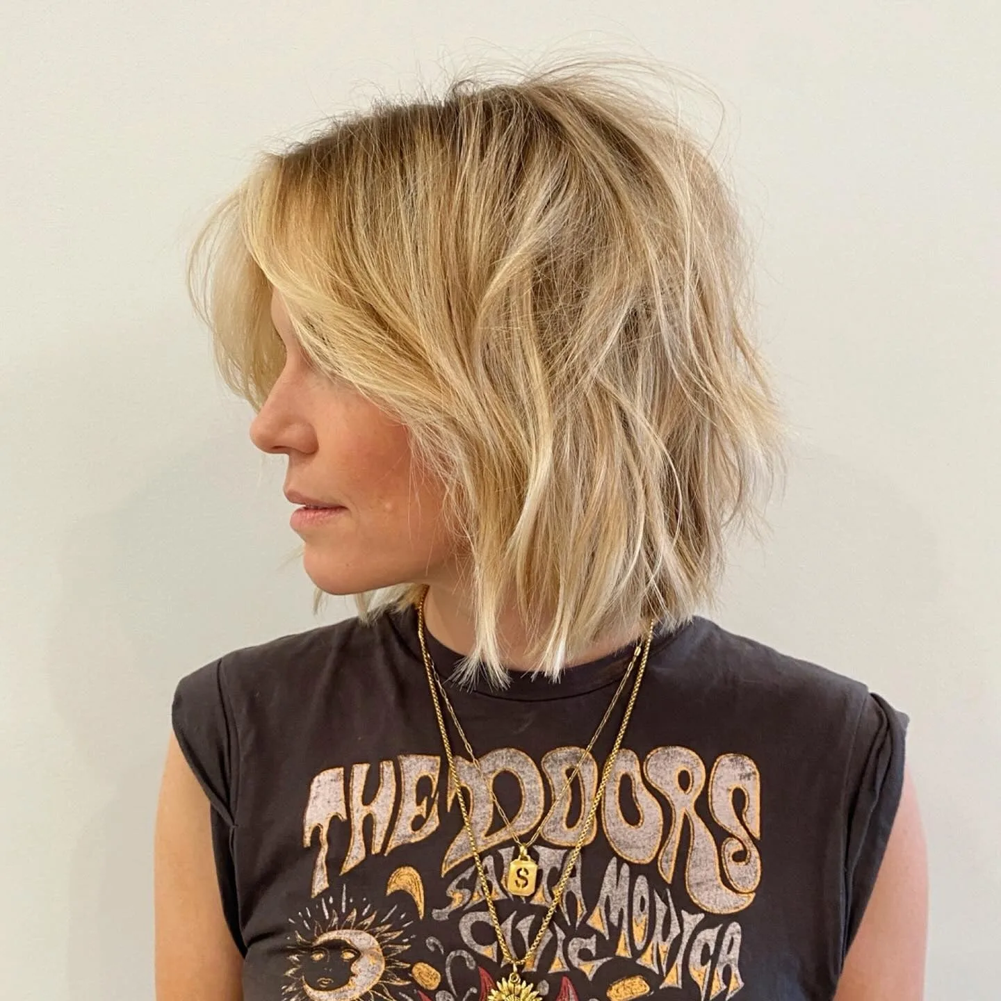 1. Textured Blonde Bob with Soft Layers (Messy Bob Haircut)