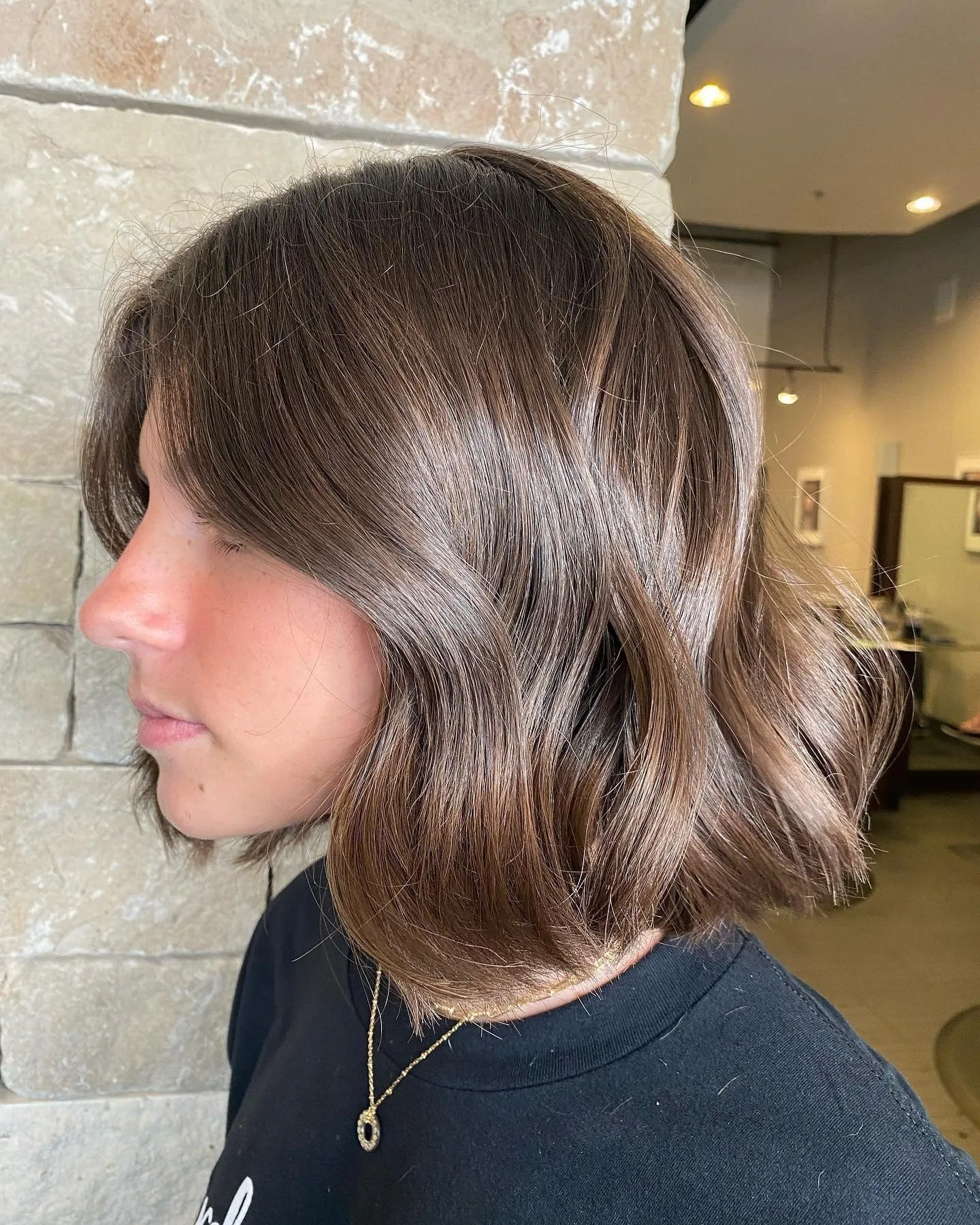 10. Glossy Cocoa Wavy Bob (Classic Bob Cut)