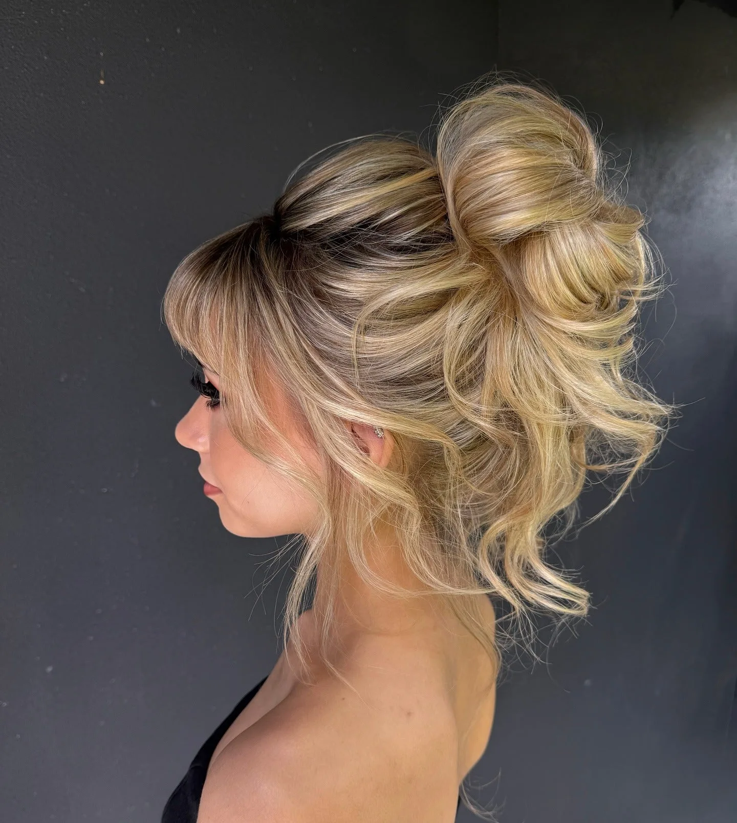 10. Wavy Blonde Bardot Bun (Messy Bun Hairstyles)