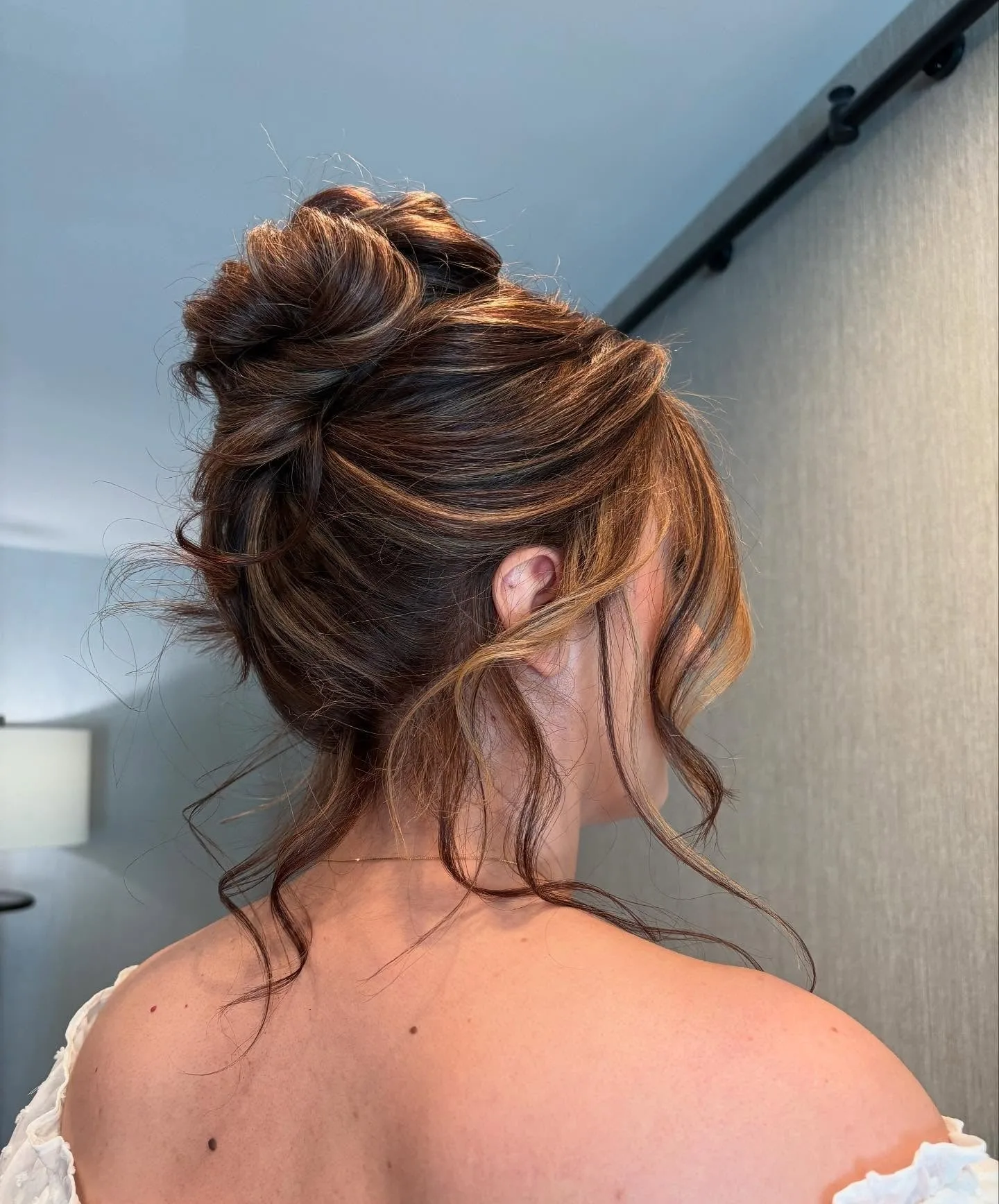 11. Chestnut Ribbon Twist Bun (Messy Bun Hairstyles)