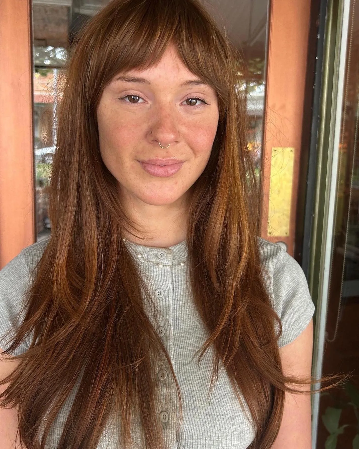 11. Rusty Auburn Layers with Soft Fringe (Messy Fringe Haircut For Women)