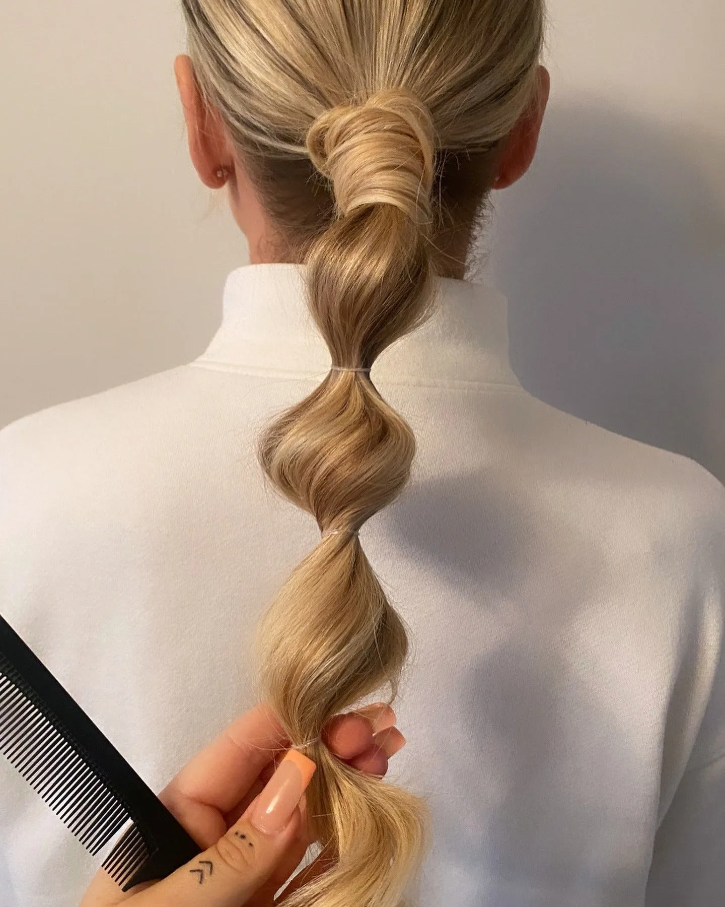 11. Wrapped Blonde Bubble Ponytail with Soft Texture (Bubble Ponytail Hairstyles)