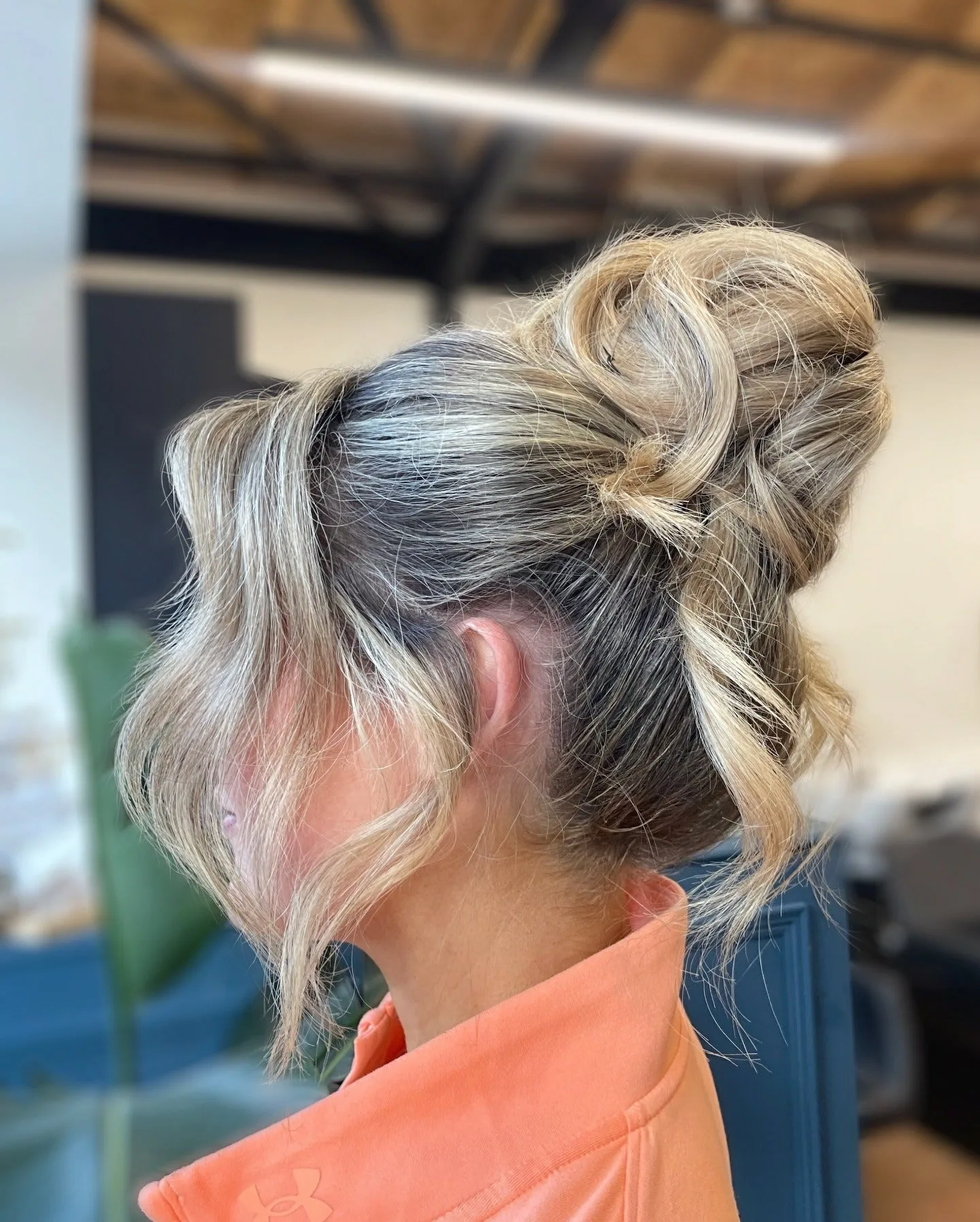 12. Dimensional Blonde Textured Knot with Voluminous Layers (Top Knot Hairstyles)