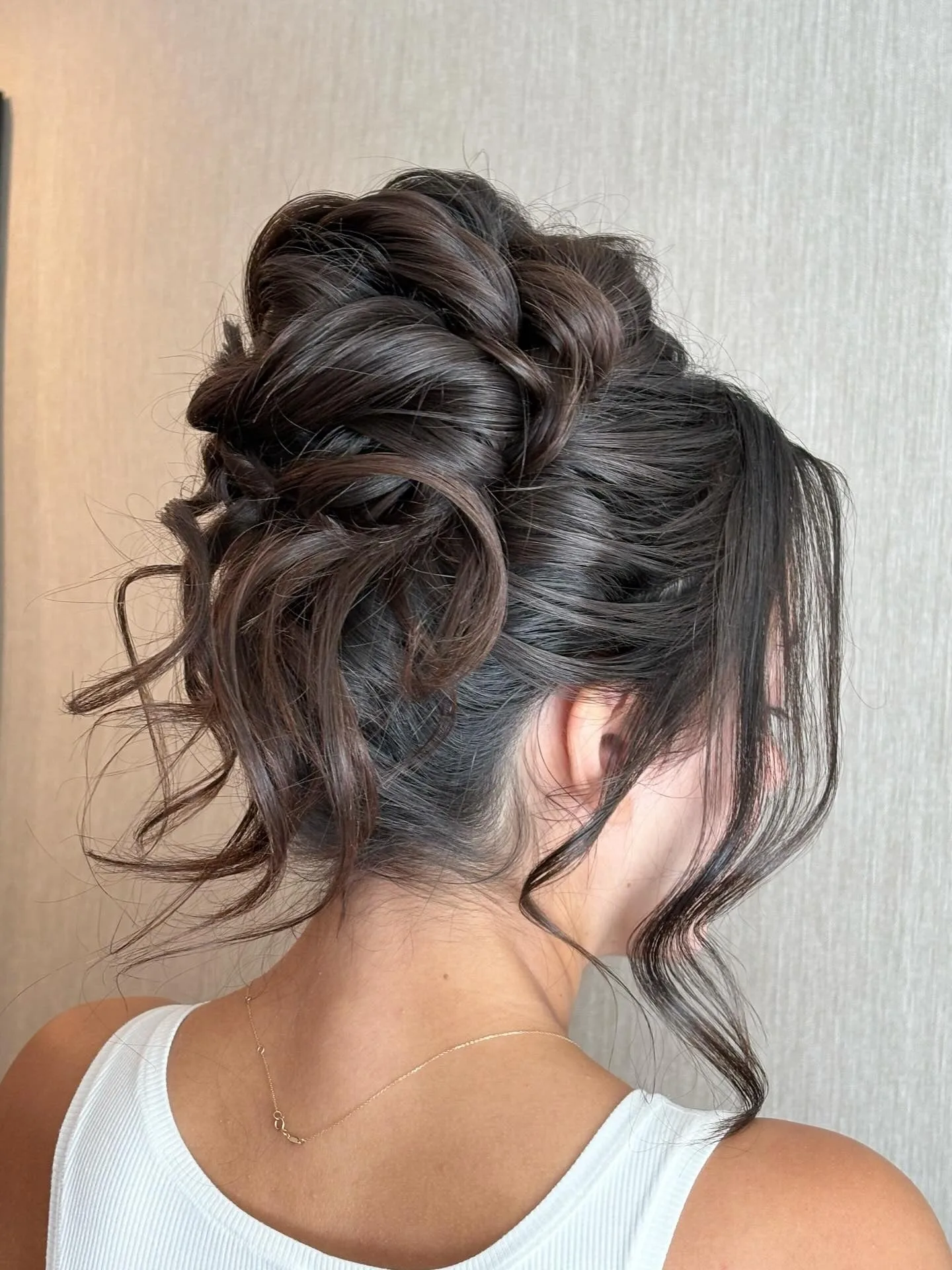 12. Espresso Braided Bun (Messy Bun Hairstyles)
