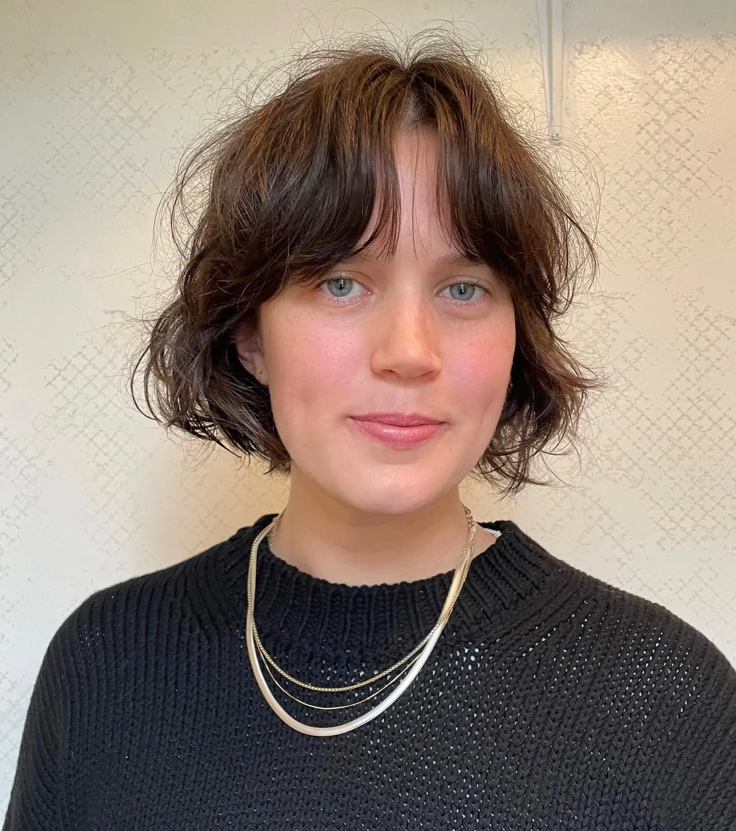 12. Textured Espresso Bob with Curtain Bangs (Shaggy Bob Haircuts)