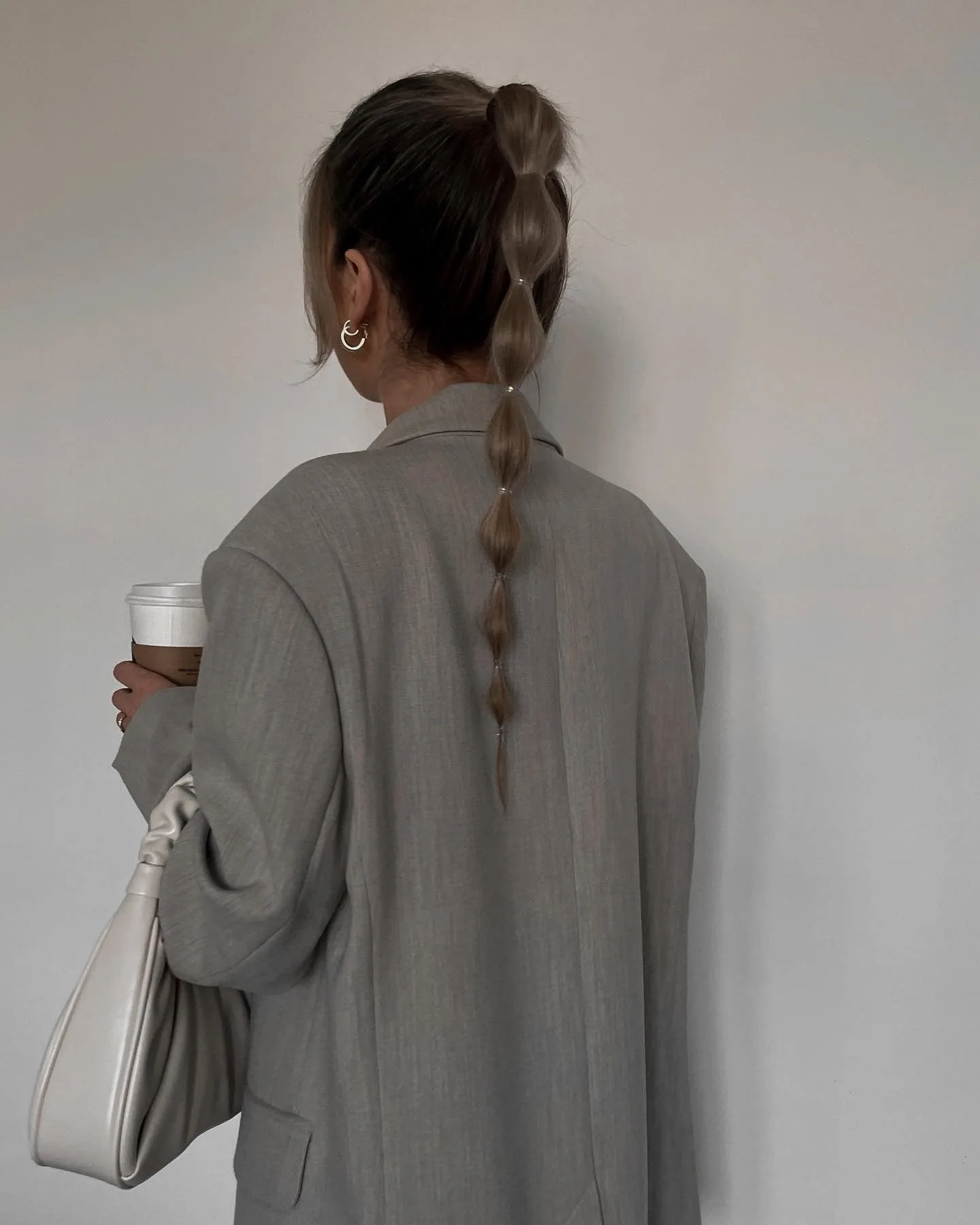 13. Ash Brown Sleek Bubble Ponytail with Minimal Aesthetic (Bubble Ponytail Hairstyles)