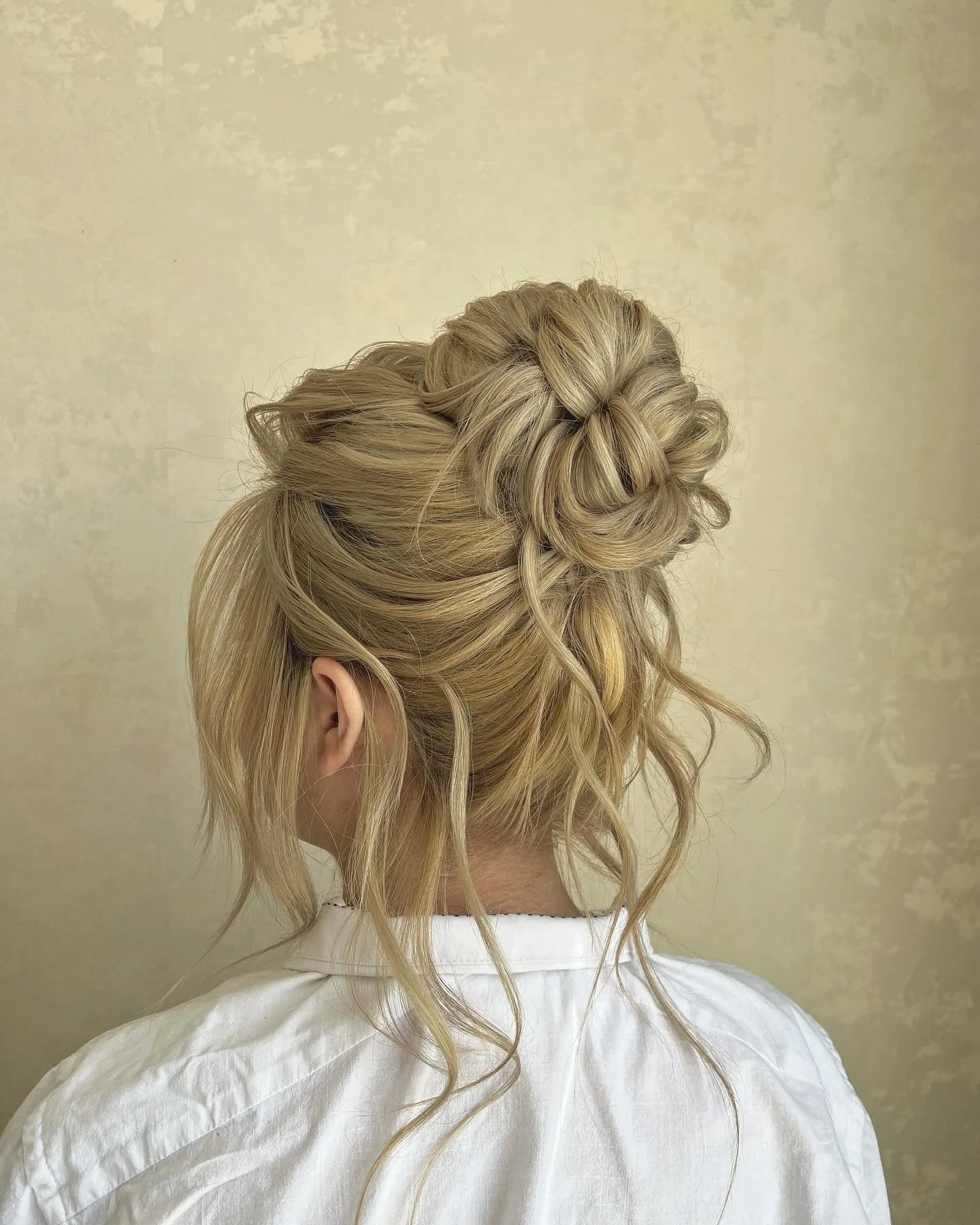 13. Golden Vanilla Braided Bun (Messy Bun Hairstyles)