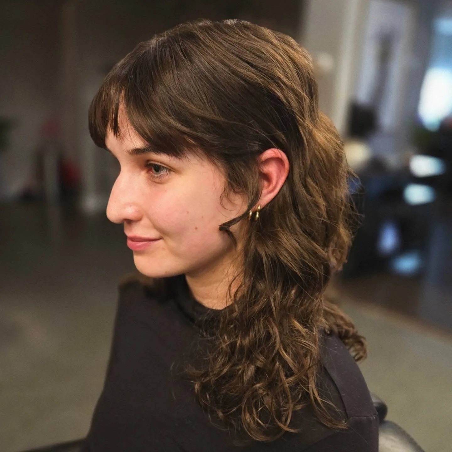 13. Textured Shag with Subtle Fringe (Wispy Bangs For Curly Hair)