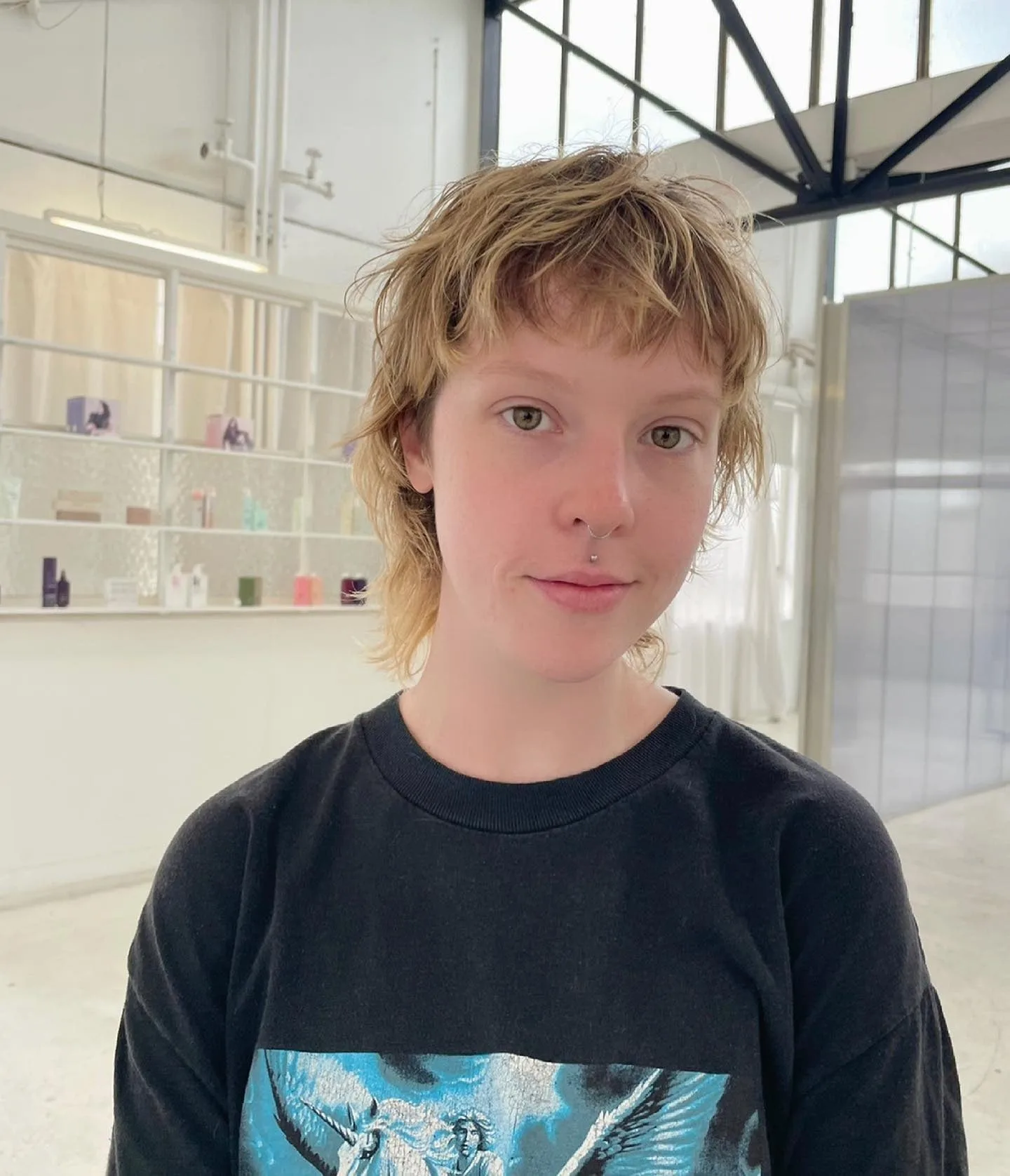 2. Golden Shag Wolf with Feathery Layers (Short Wolf Haircut)