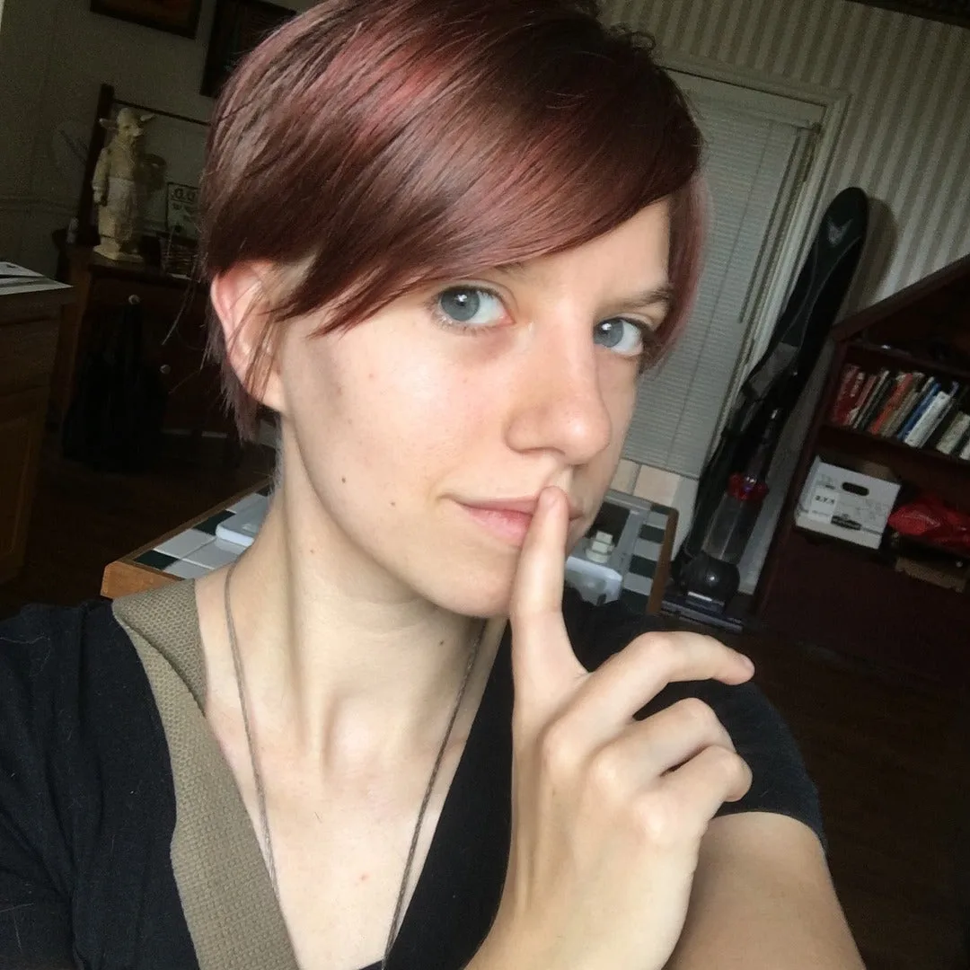 2. Mahogany Asymmetrical Pixie (Long Pixie Cuts)
