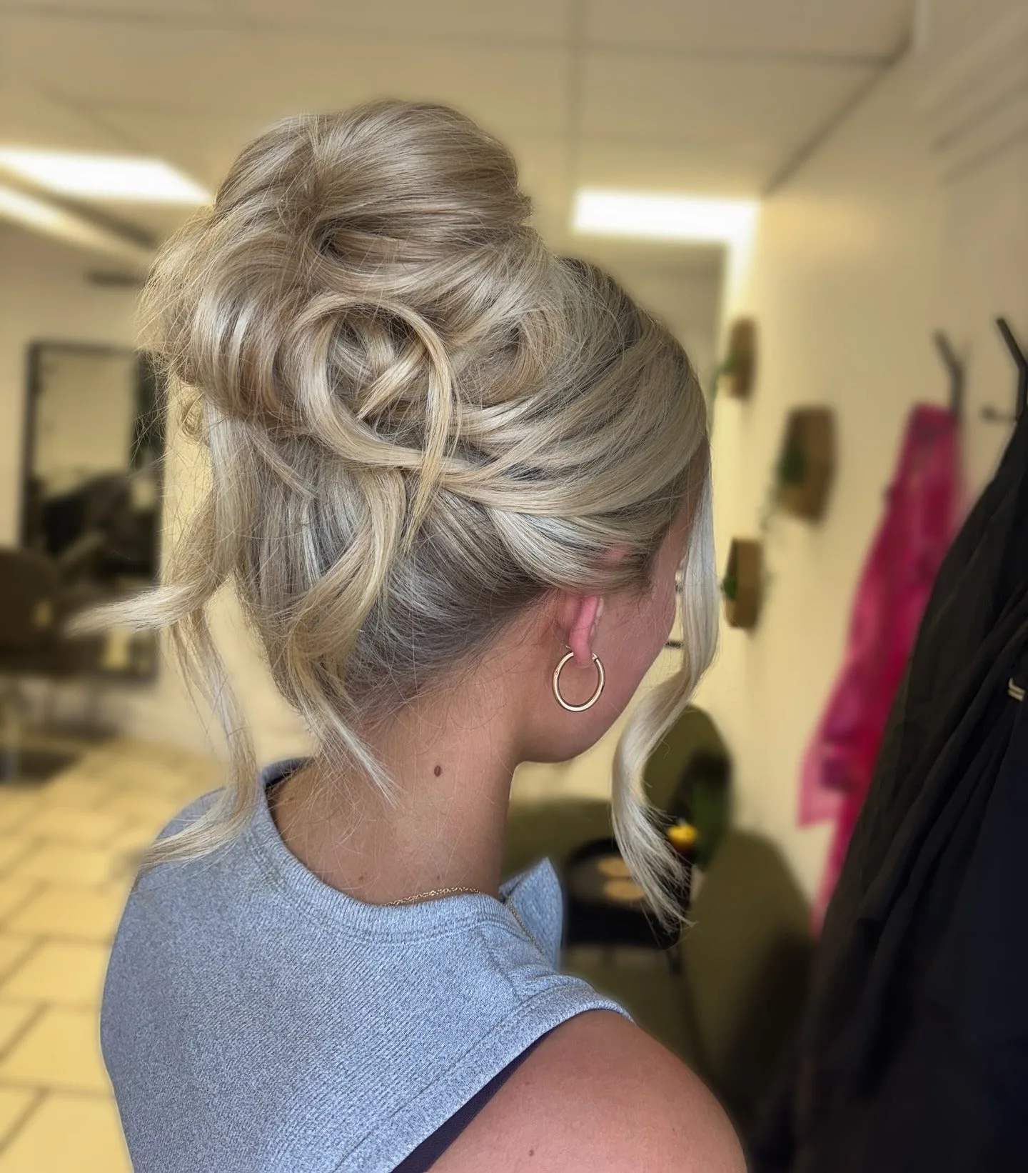 2. Soft Blonde Volume Bun (Messy Bun Hairstyles)