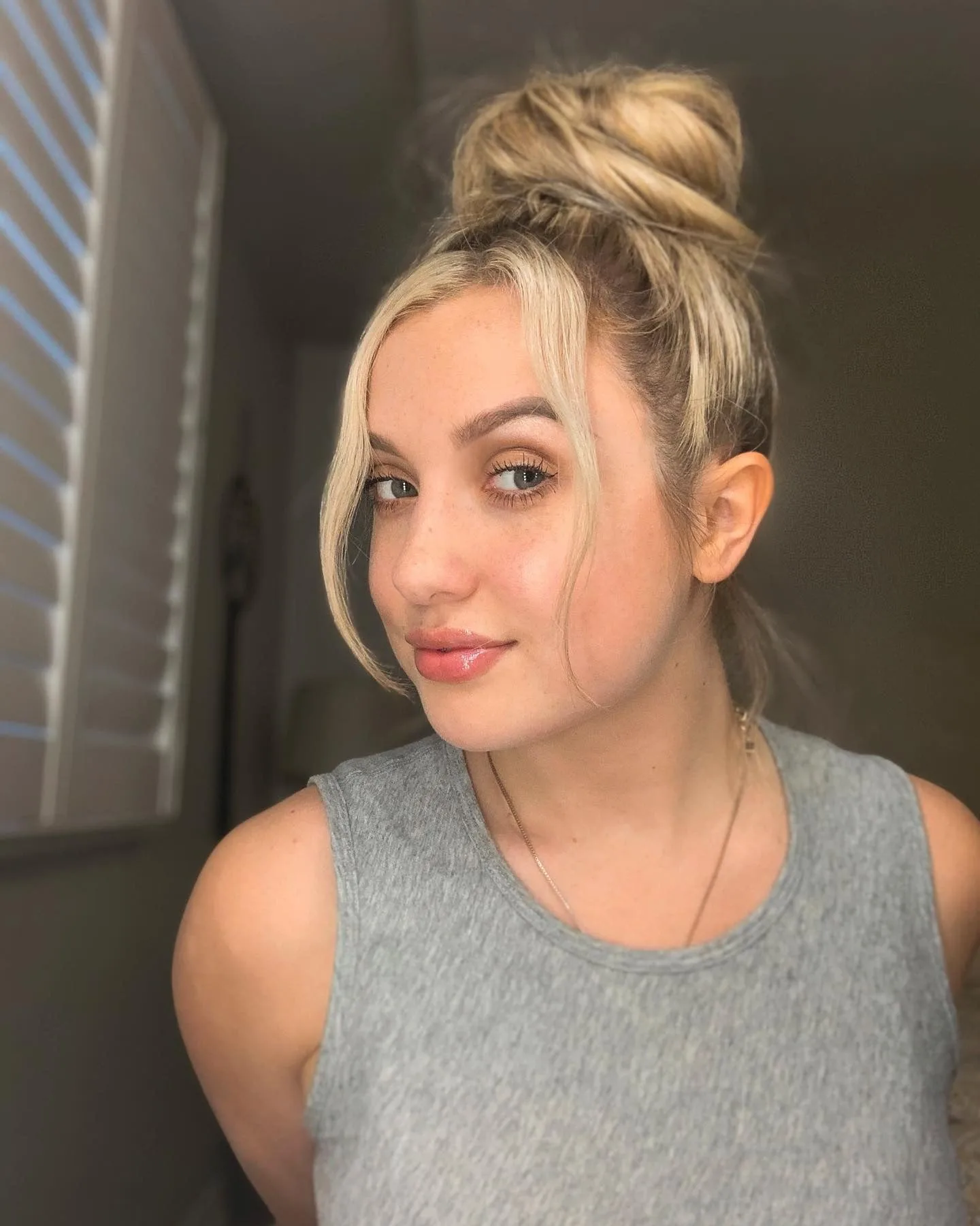 2. Sun-Kissed Blonde Top Knot with Effortless Texture (Top Knot Hairstyles)