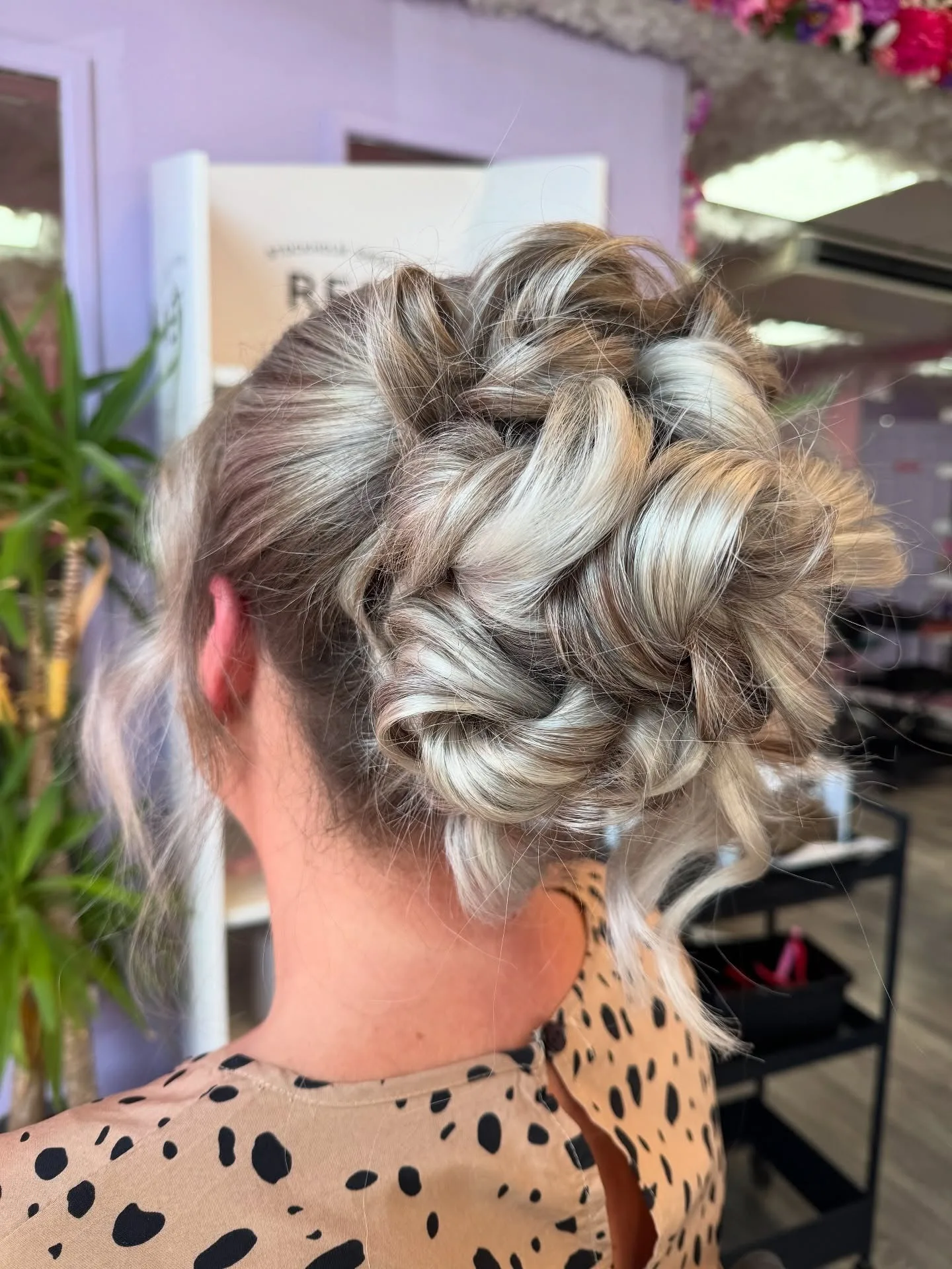 3. Braided Silver Ash Bun (Messy Bun Hairstyles)