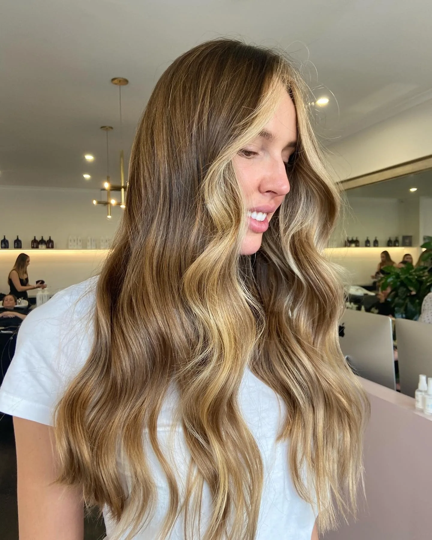 3. Buttery Balayage Glam (Caramel Honey Blonde)