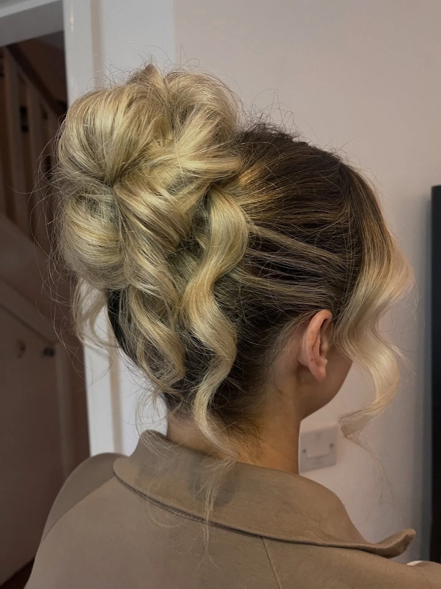 4. Golden Tousled Bun (Messy Bun Hairstyles)