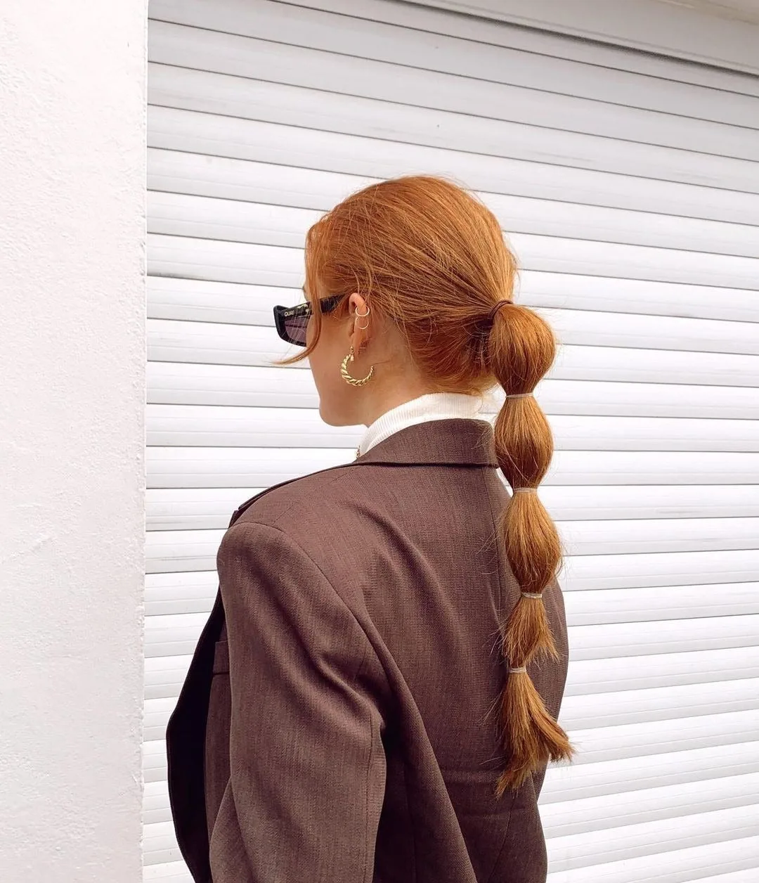 6. Classic Copper Bubble Ponytail with Retro Flair (Bubble Ponytail Hairstyles)