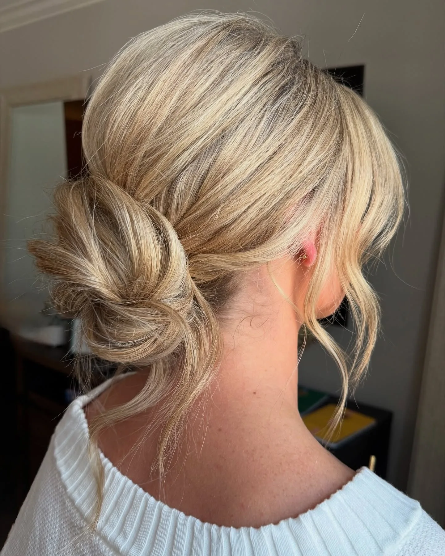7. Low Champagne Knot Bun (Messy Bun Hairstyles)