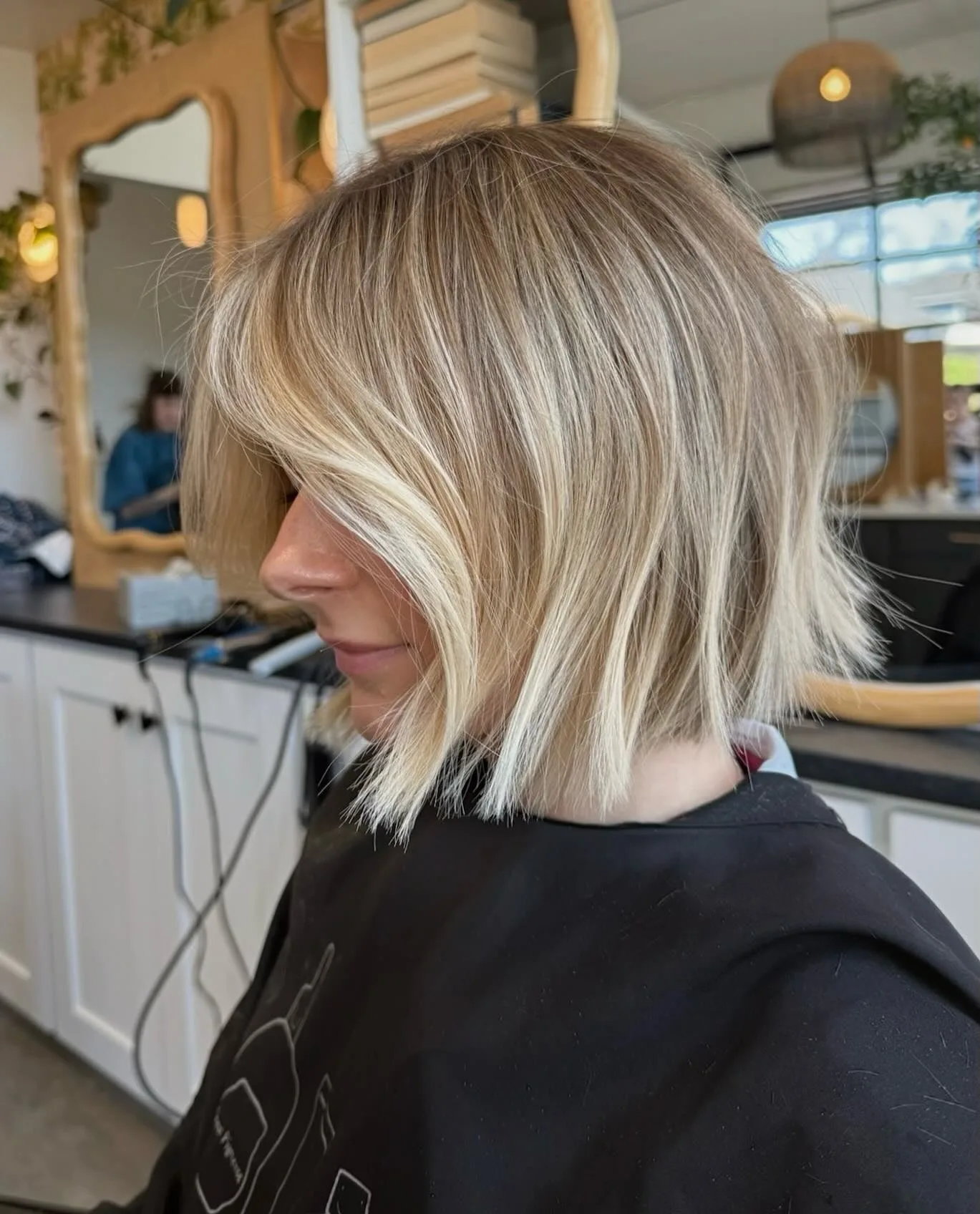 8. Layered Blonde Bob with Curtain Bangs (Messy Bob Haircut)