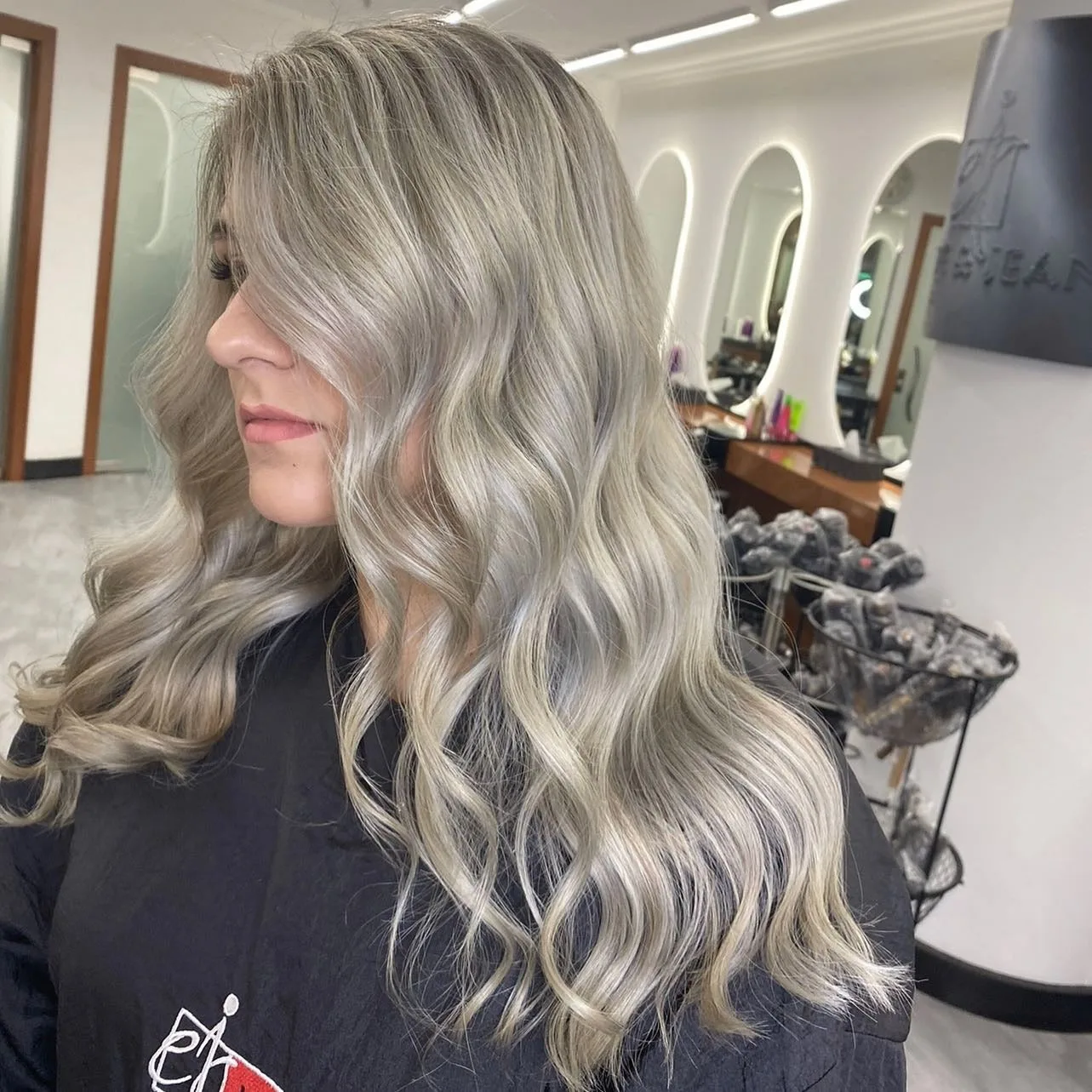 8. Pearlescent Champagne Curls (Champagne Blonde Hair Color)