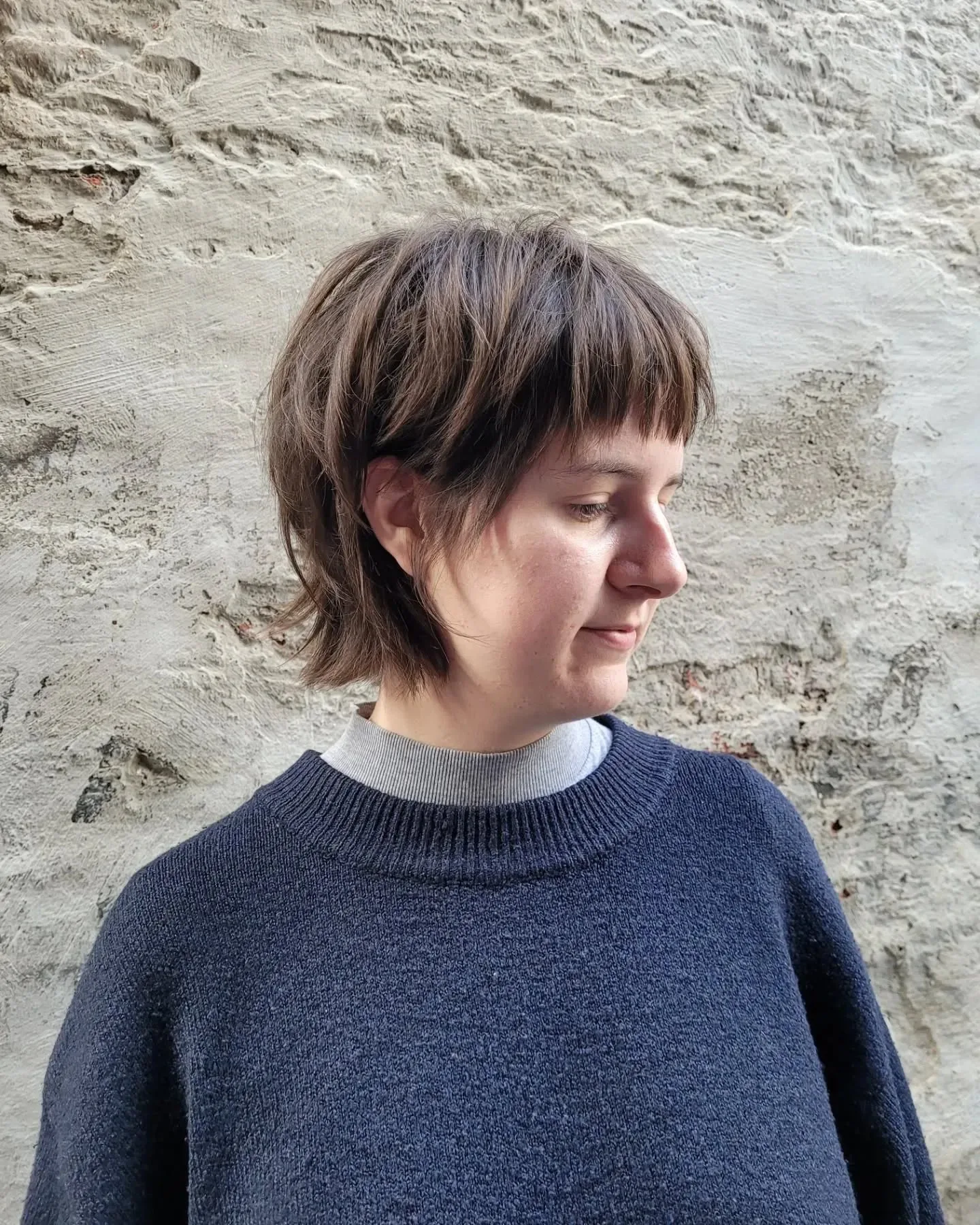 8. Sandy Blonde Layered Wolf Shag (Short Wolf Haircut)