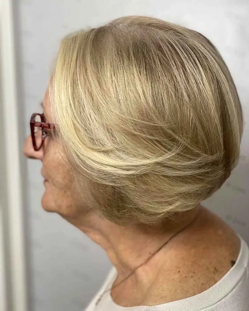 chic feathered bob for seniors with glasses
