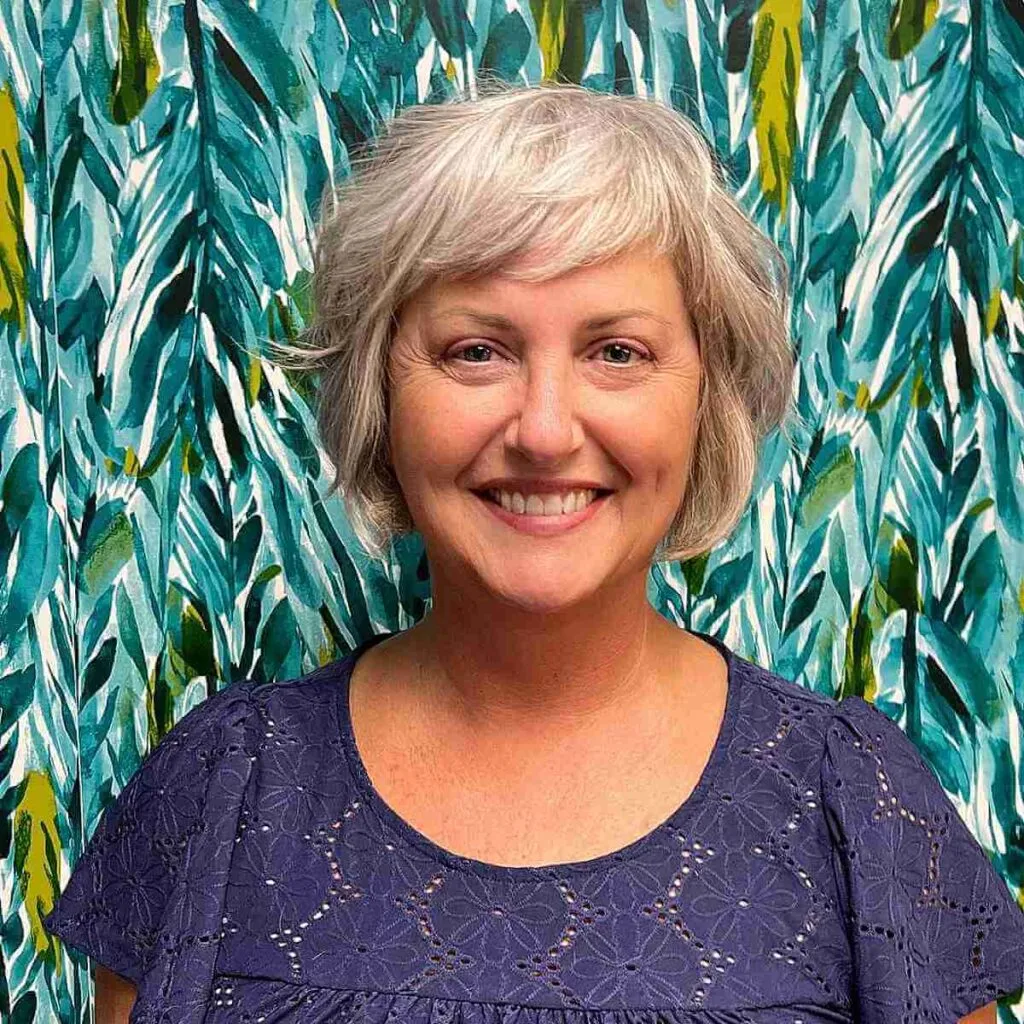 Chic Layers and Fringe on a Textured Bob for Women Over 50