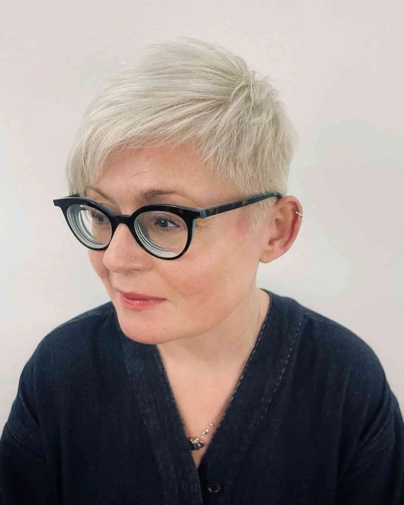 Chic Textured Pixie with Elongated Side Bangs and Glasses