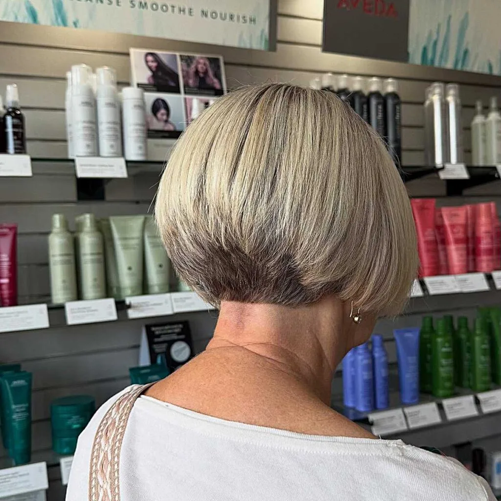 Cool Blonde Stacked Bob with Exposed Nape and Layered Dimension