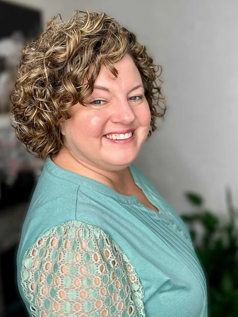 Curly bob with blonde highlights and brown lowlights