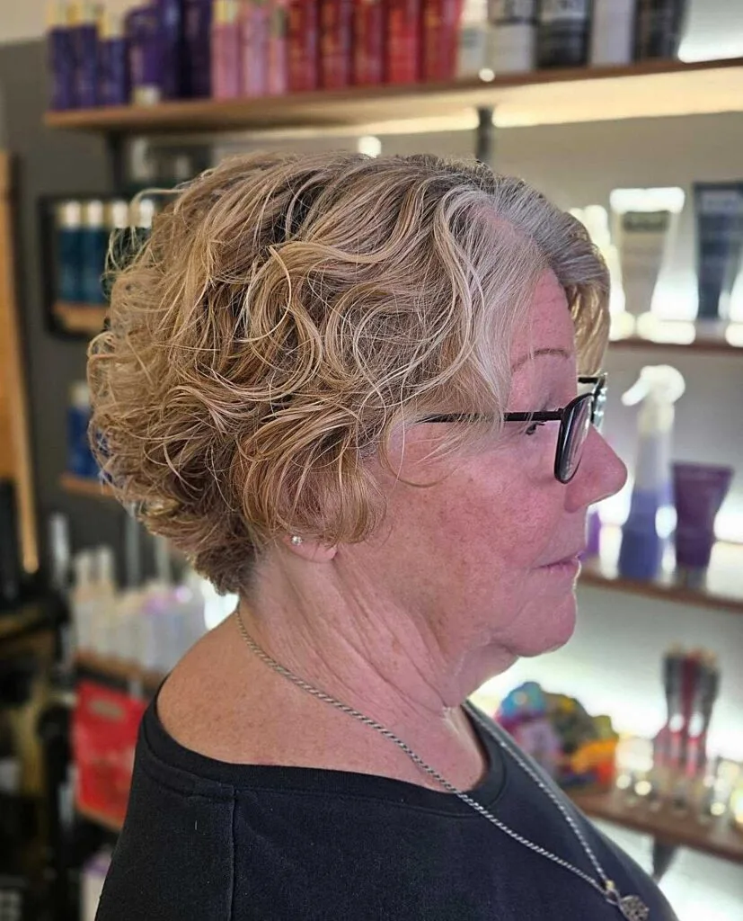 Curly Golden Bob with Stacked Nape and Natural Gray Roots