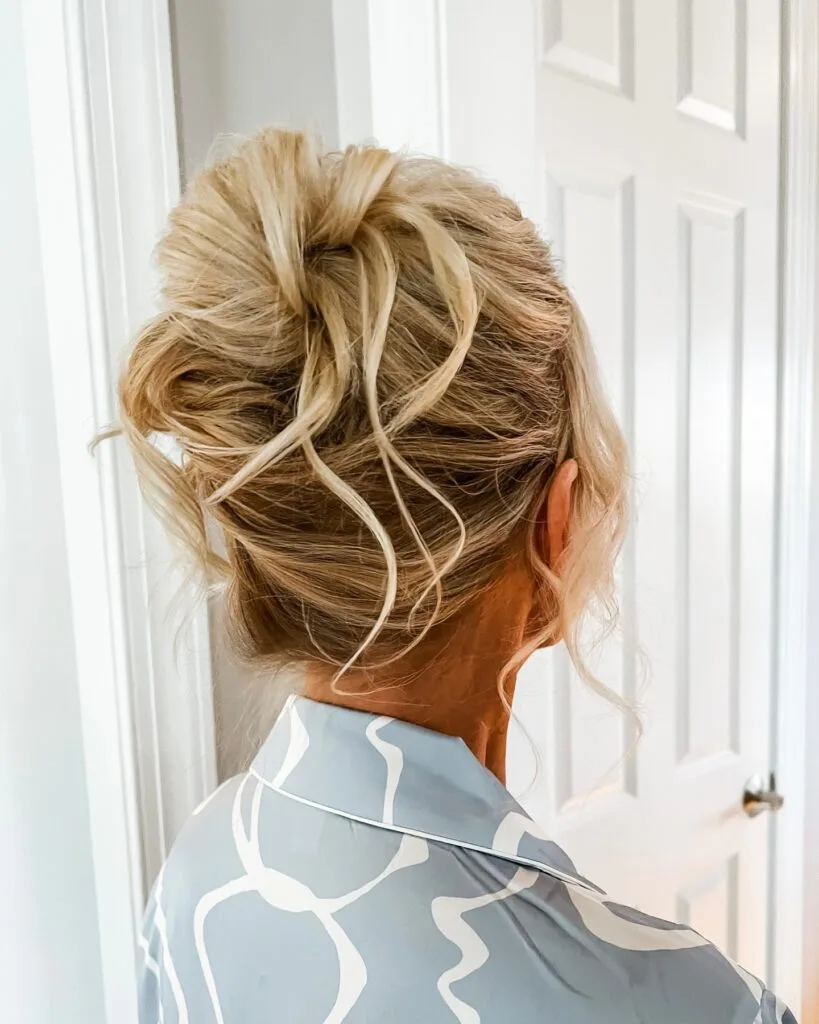 Effortless Textured Updo with Soft Tendrils