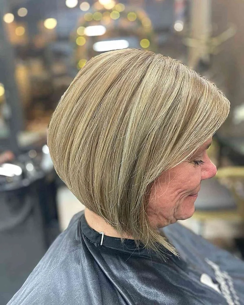 Elegant Blonde for a Slanted Neck-Length Bob on Senior Women Aged 50