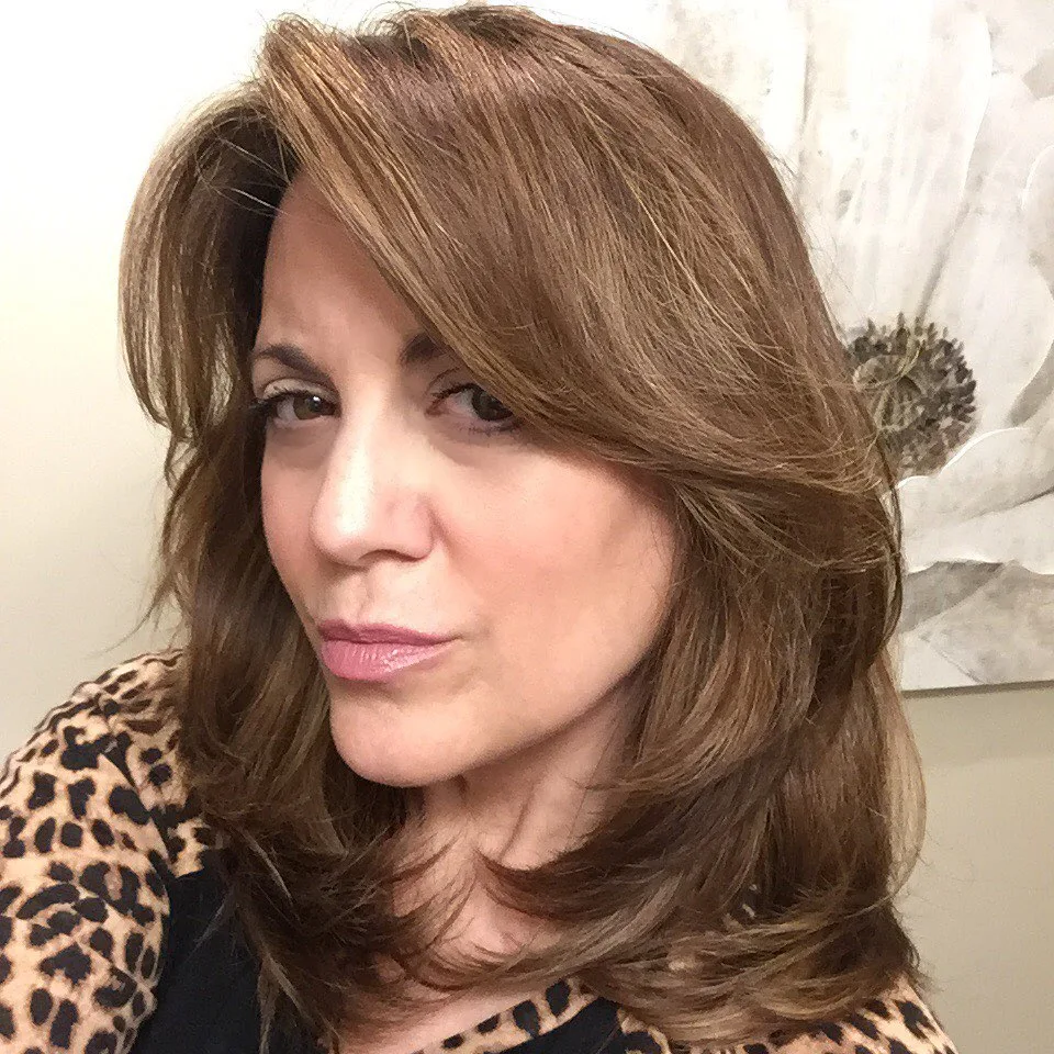 Elegant Layered Cut with Soft Side-Swept Bangs