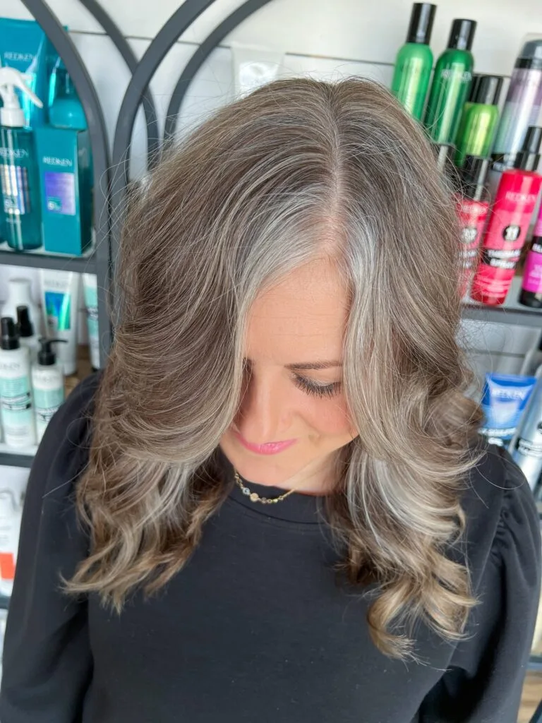 Elegant Long Layered Gray and Blonde Blend with Soft Waves