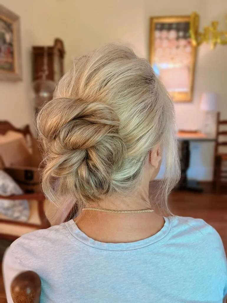 Elegant Twisted Low Bun with Soft Volume