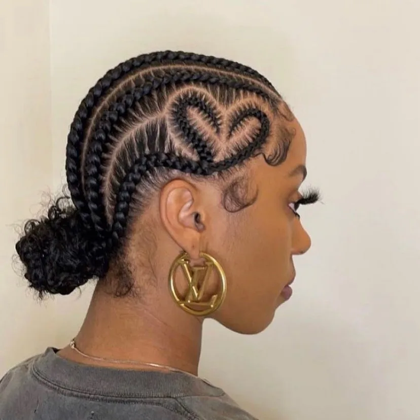 Intricate Heart-Designed Braids with Low Bun