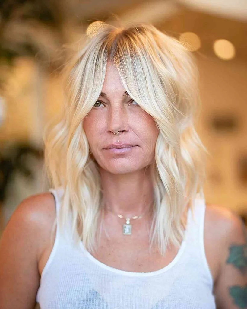 Medium Face-Framing Haircut with Soft Waves for Thinner Locks on 50-Over Women